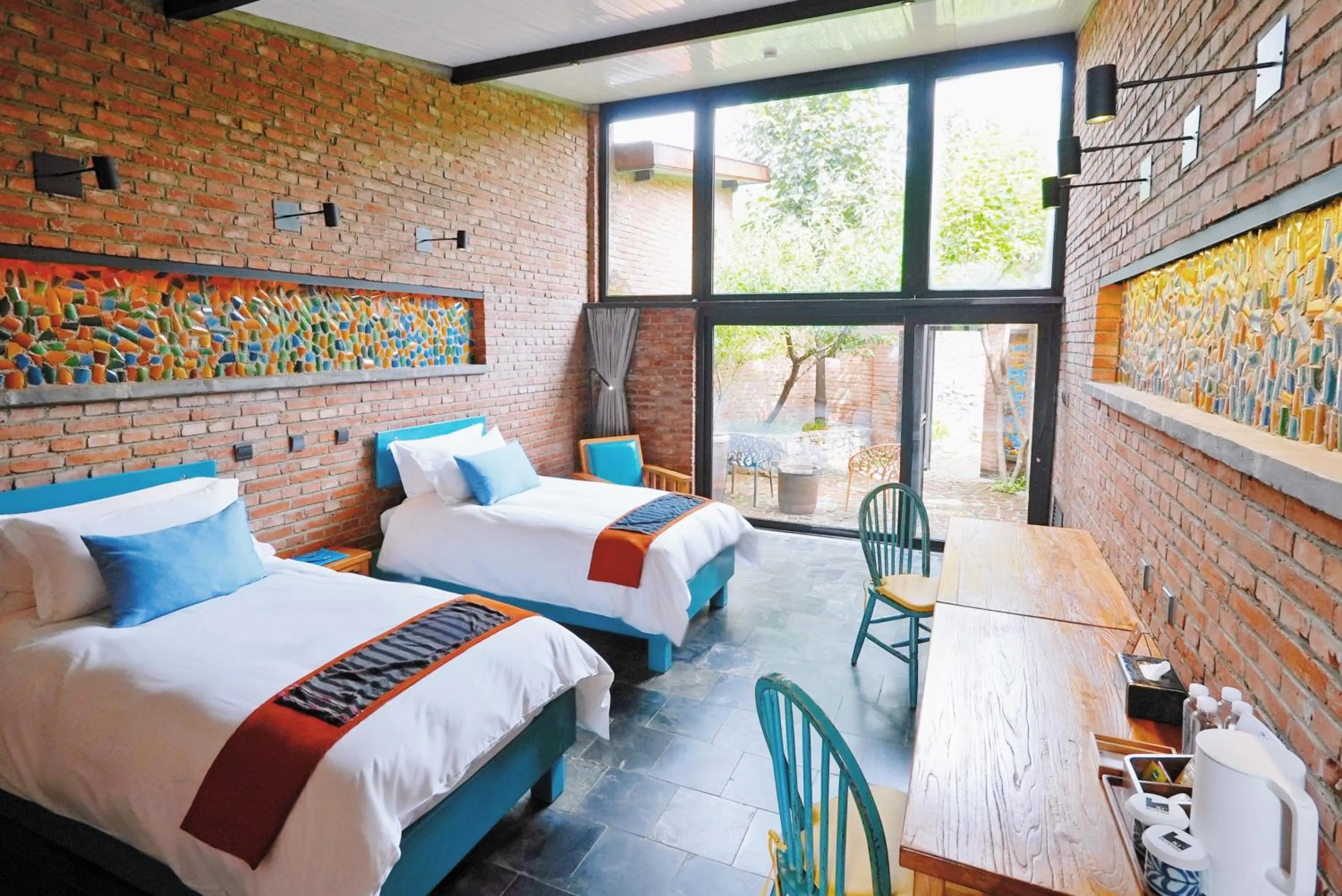 Bed in Brickyard Retreat at Mutianyu Great Wall Adjoin to Mutianyu Great Wall - Room with the View of Great Wall - Jacuzzi with the View of Great Wall - Vehicle Shuttle Service - International Catering - SPA& Nail Beauty Facilities