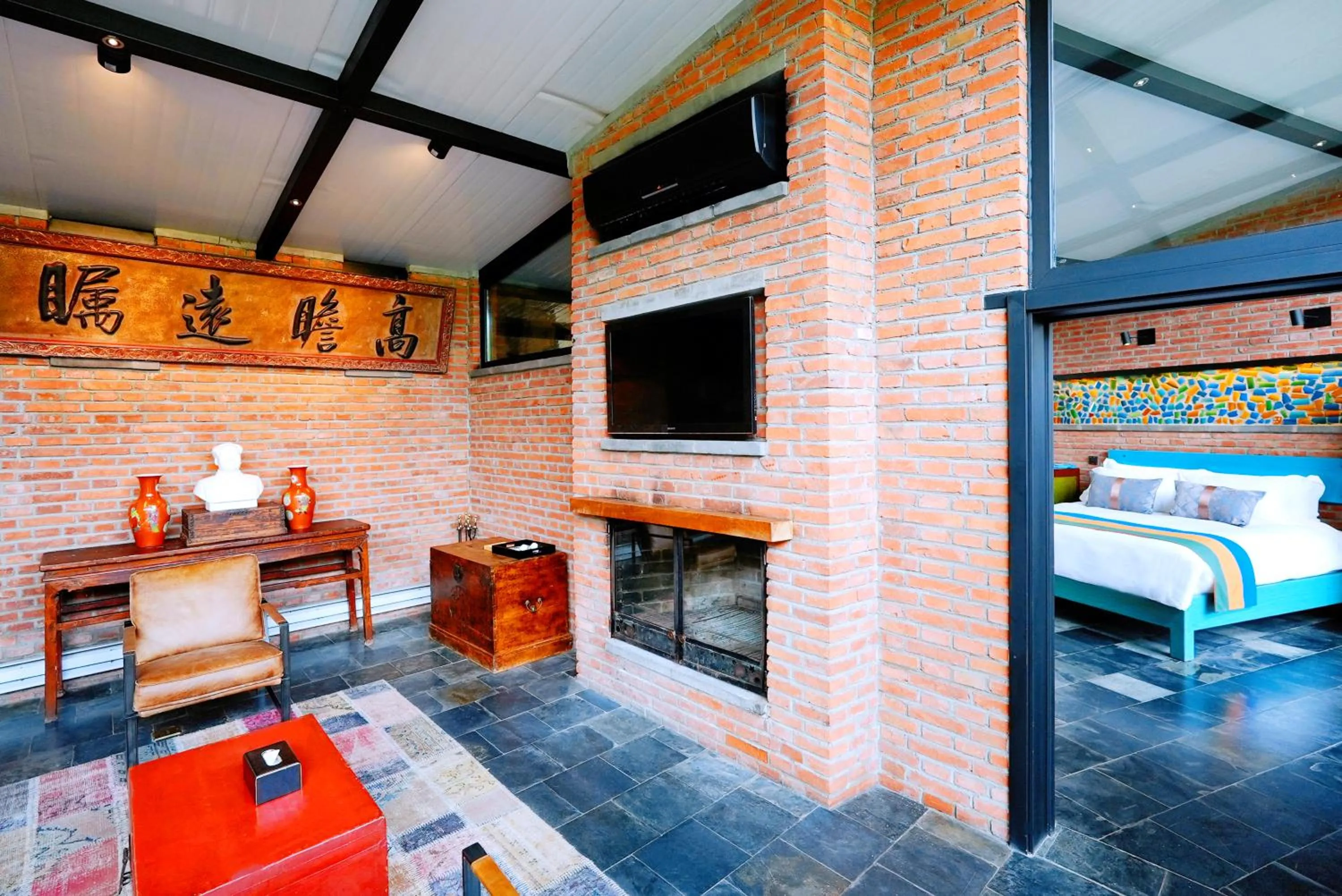 TV and multimedia in Brickyard Retreat at Mutianyu Great Wall Adjoin to Mutianyu Great Wall - Room with the View of Great Wall - Jacuzzi with the View of Great Wall - Vehicle Shuttle Service - International Catering - SPA& Nail Beauty Facilities