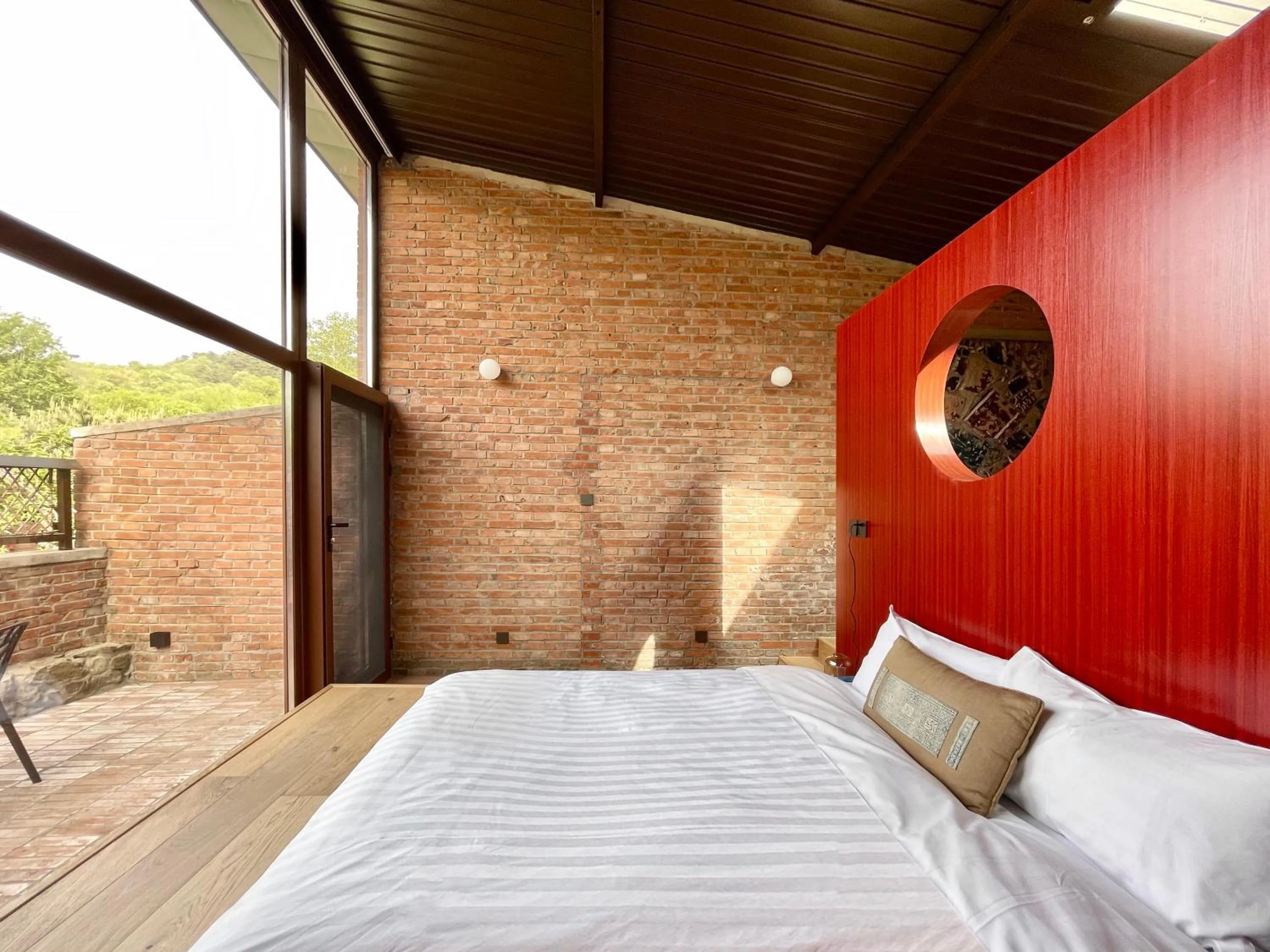 Photo of the whole room, Bed in Brickyard Retreat at Mutianyu Great Wall Adjoin to Mutianyu Great Wall - Room with the View of Great Wall - Jacuzzi with the View of Great Wall - Vehicle Shuttle Service - International Catering - SPA& Nail Beauty Facilities