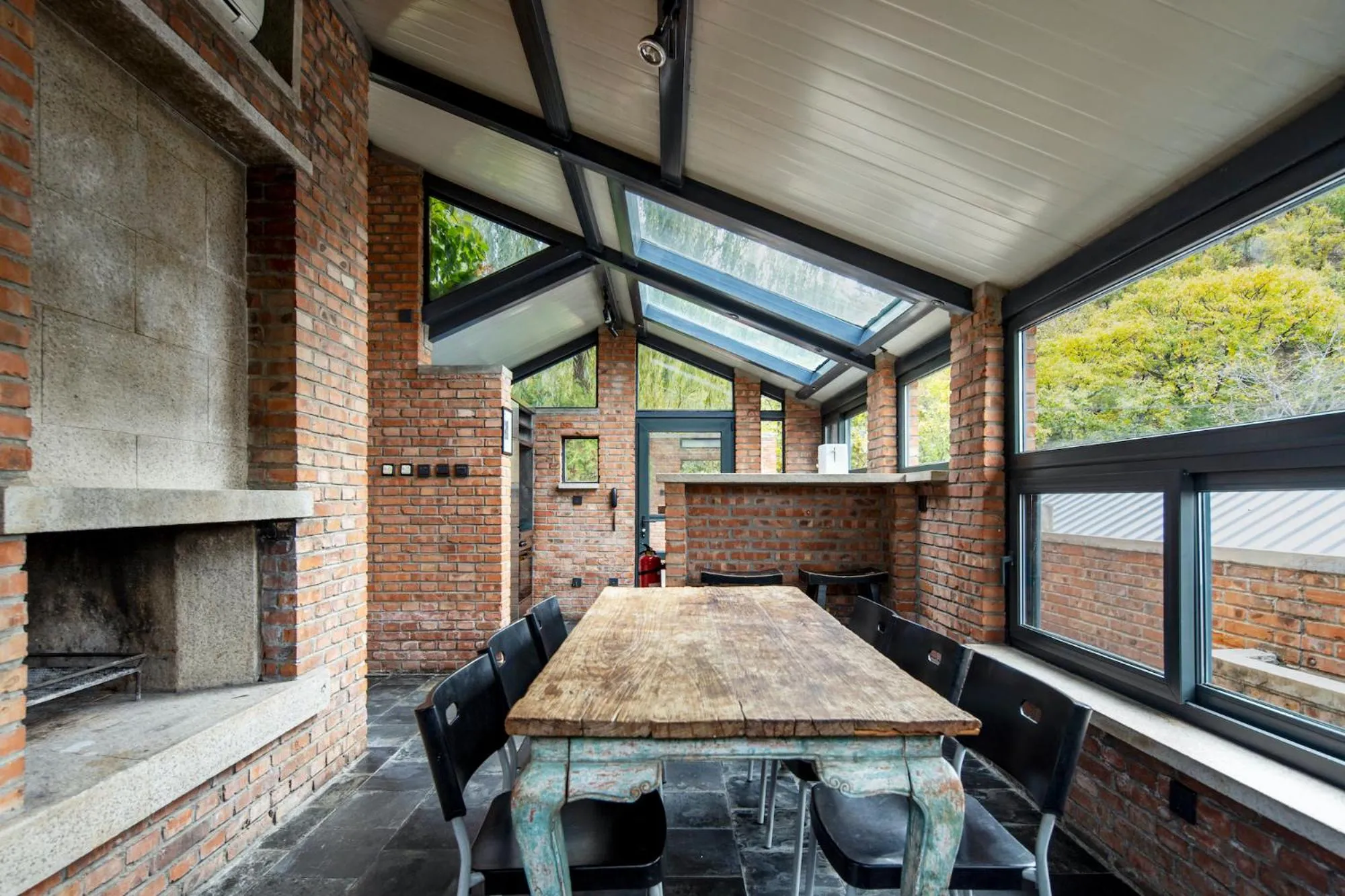 Dining area in Brickyard Retreat at Mutianyu Great Wall Adjoin to Mutianyu Great Wall - Room with the View of Great Wall - Jacuzzi with the View of Great Wall - Vehicle Shuttle Service - International Catering - SPA& Nail Beauty Facilities