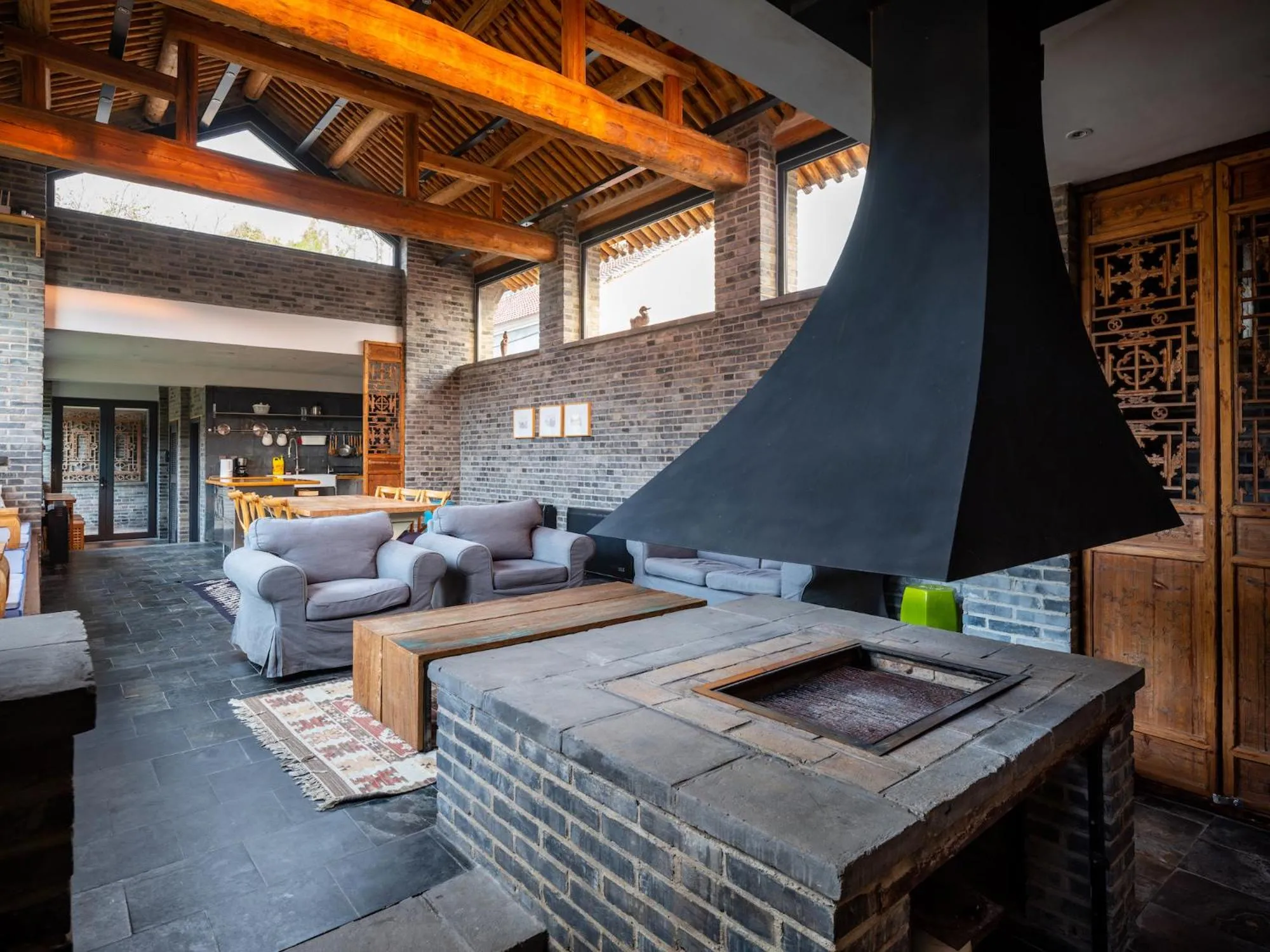 Living room in Brickyard Retreat at Mutianyu Great Wall Adjoin to Mutianyu Great Wall - Room with the View of Great Wall - Jacuzzi with the View of Great Wall - Vehicle Shuttle Service - International Catering - SPA& Nail Beauty Facilities