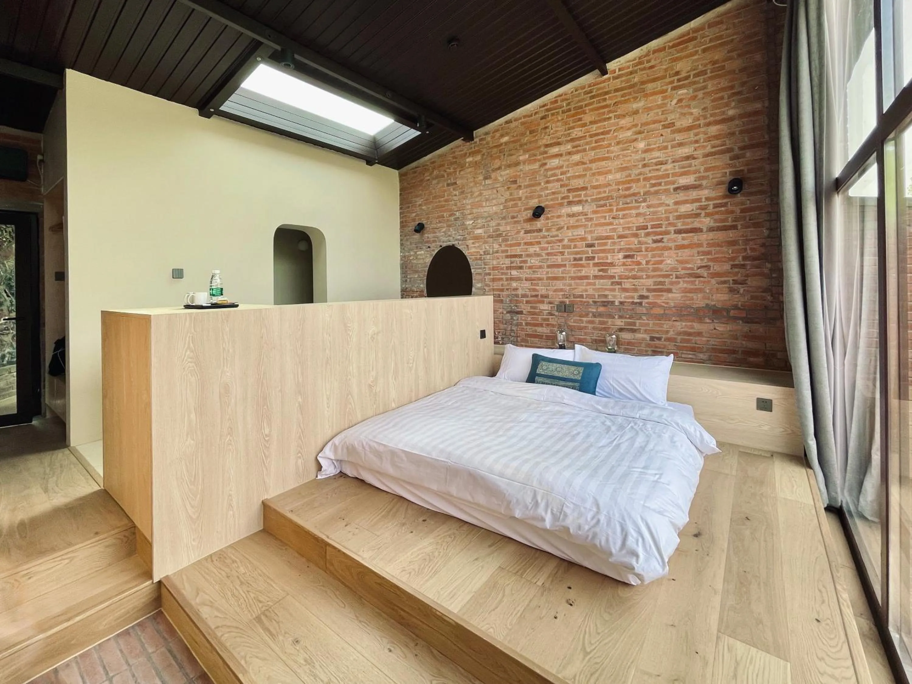 Photo of the whole room, Bed in Brickyard Retreat at Mutianyu Great Wall Adjoin to Mutianyu Great Wall - Room with the View of Great Wall - Jacuzzi with the View of Great Wall - Vehicle Shuttle Service - International Catering - SPA& Nail Beauty Facilities