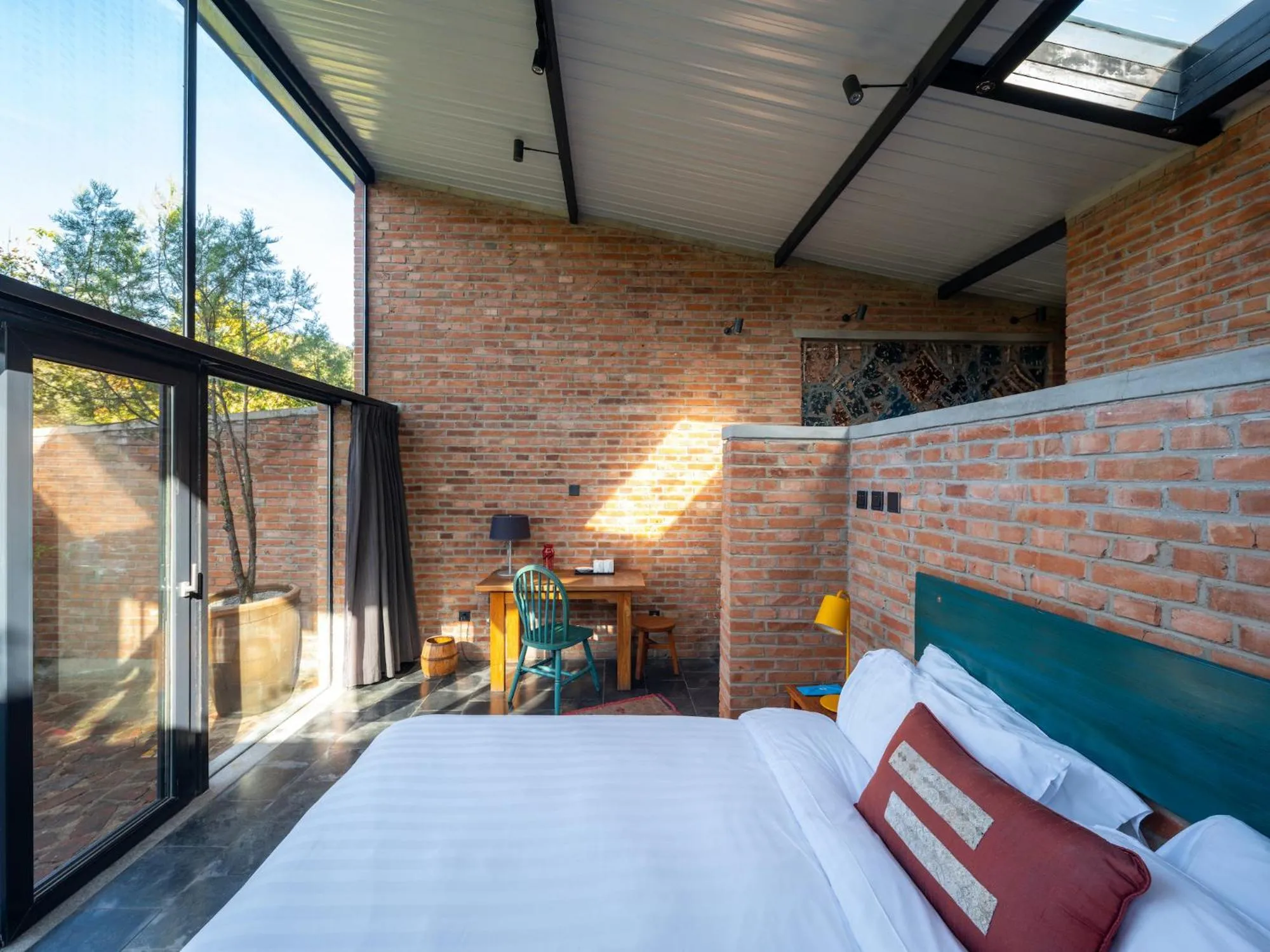 Bed in Brickyard Retreat at Mutianyu Great Wall Adjoin to Mutianyu Great Wall - Room with the View of Great Wall - Jacuzzi with the View of Great Wall - Vehicle Shuttle Service - International Catering - SPA& Nail Beauty Facilities