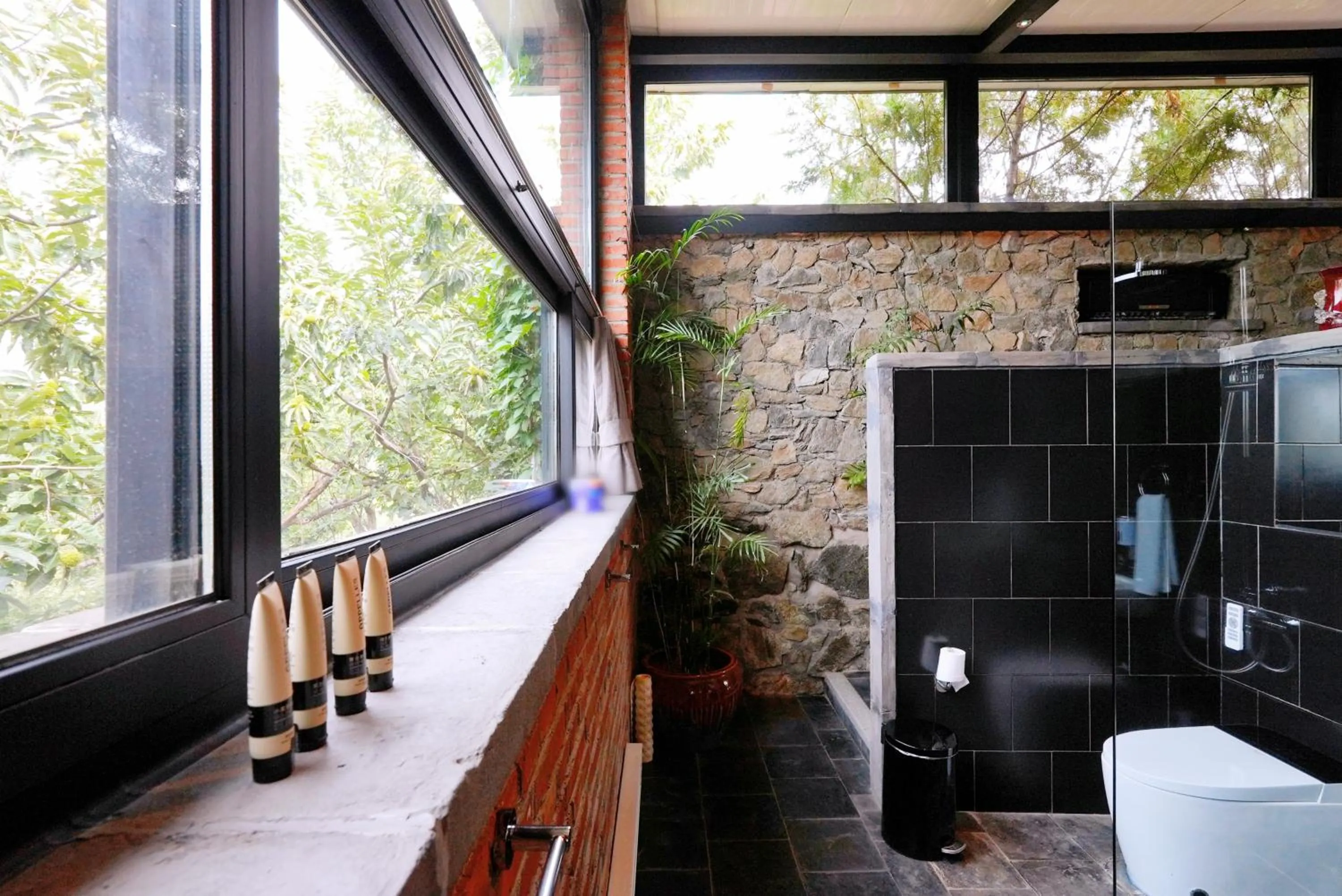 Toilet in Brickyard Retreat at Mutianyu Great Wall Adjoin to Mutianyu Great Wall - Room with the View of Great Wall - Jacuzzi with the View of Great Wall - Vehicle Shuttle Service - International Catering - SPA& Nail Beauty Facilities