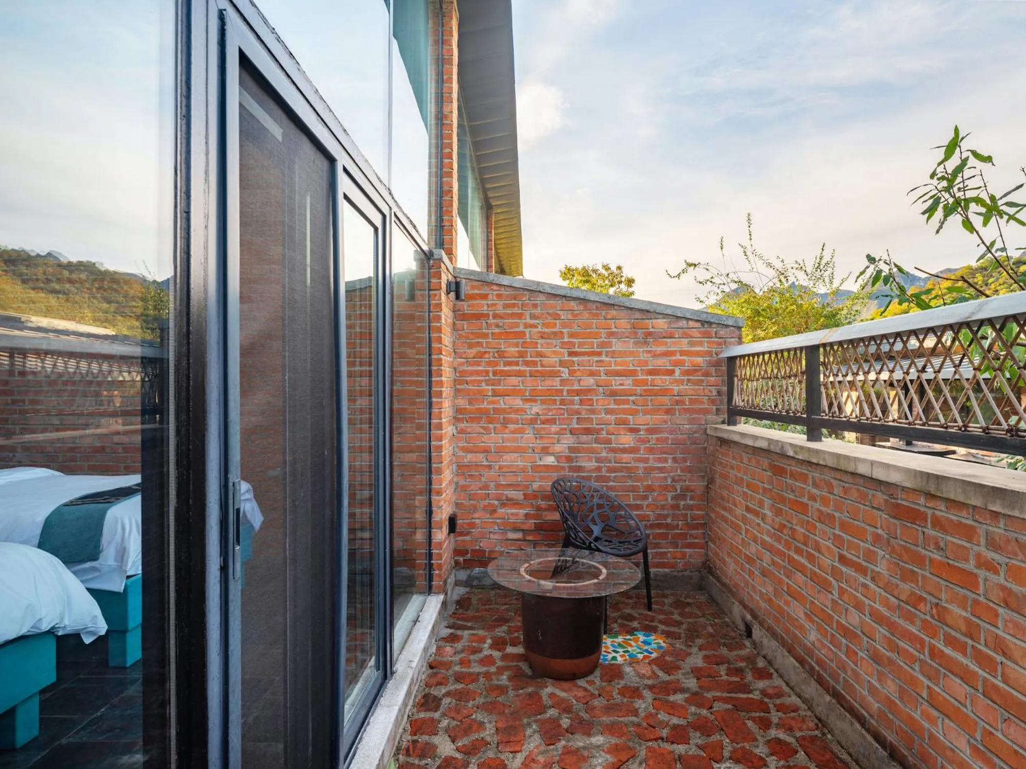 Balcony/Terrace in Brickyard Retreat at Mutianyu Great Wall Adjoin to Mutianyu Great Wall - Room with the View of Great Wall - Jacuzzi with the View of Great Wall - Vehicle Shuttle Service - International Catering - SPA& Nail Beauty Facilities