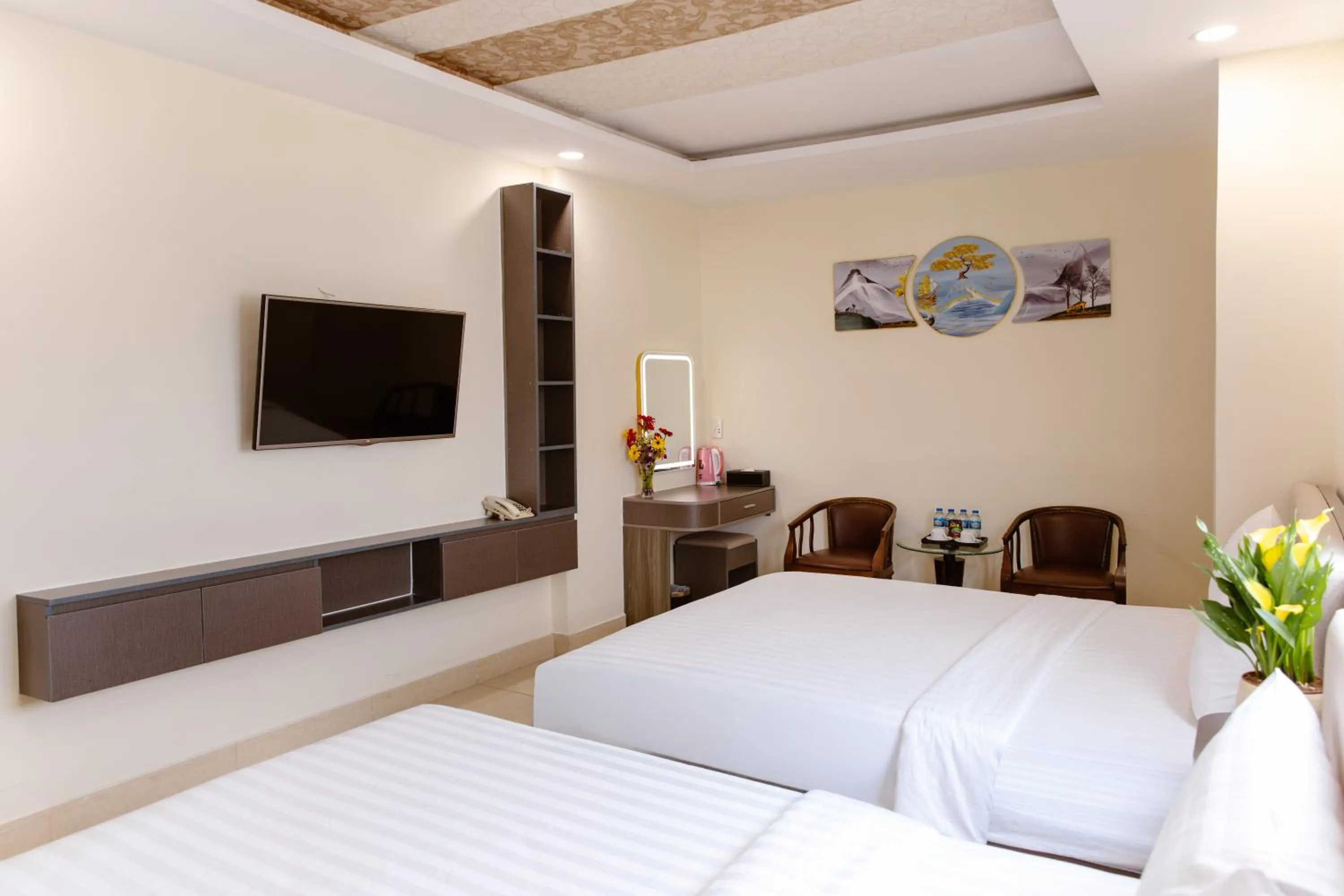 Bed in Boss Palace Hotel