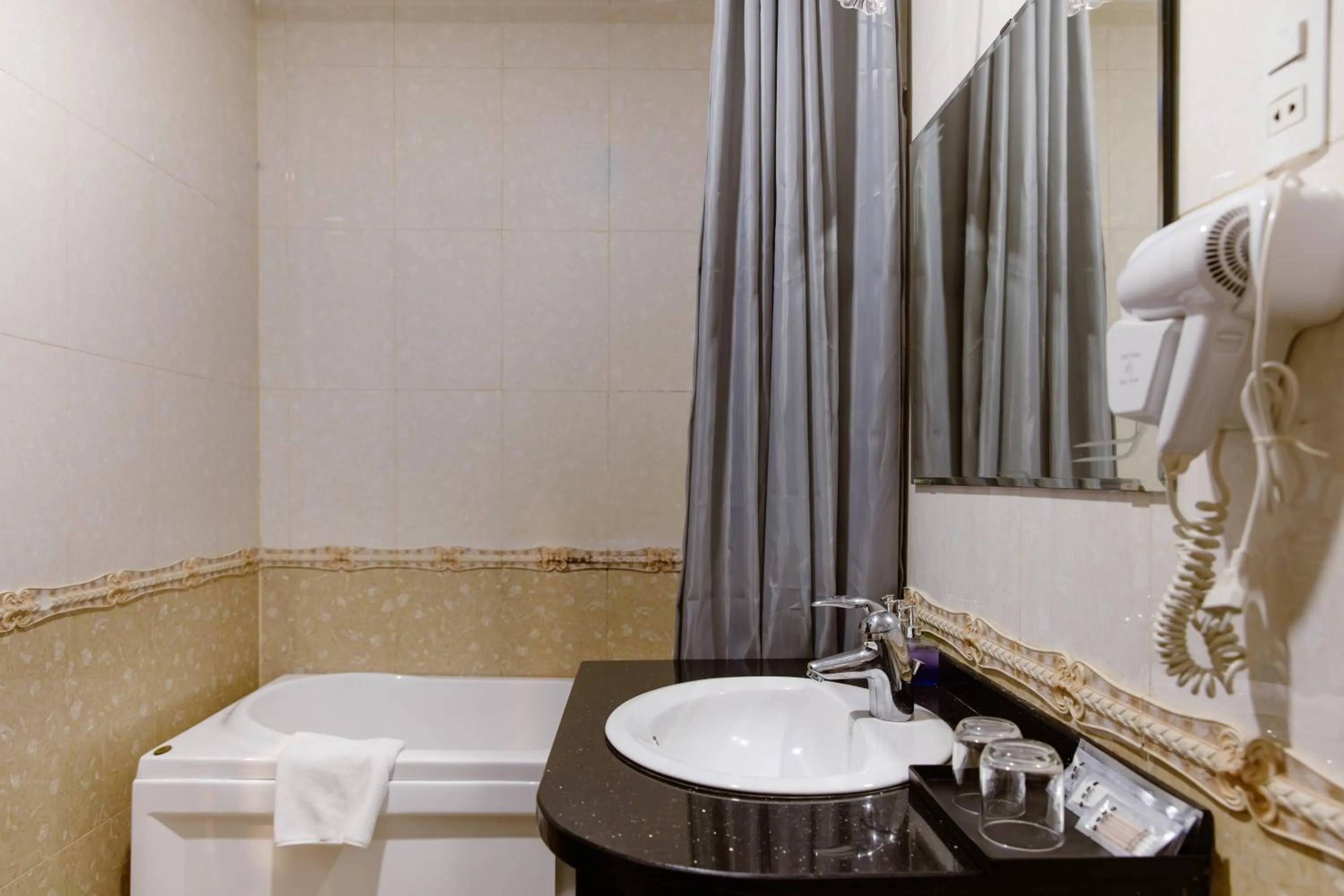 Bathroom in Boss Palace Hotel