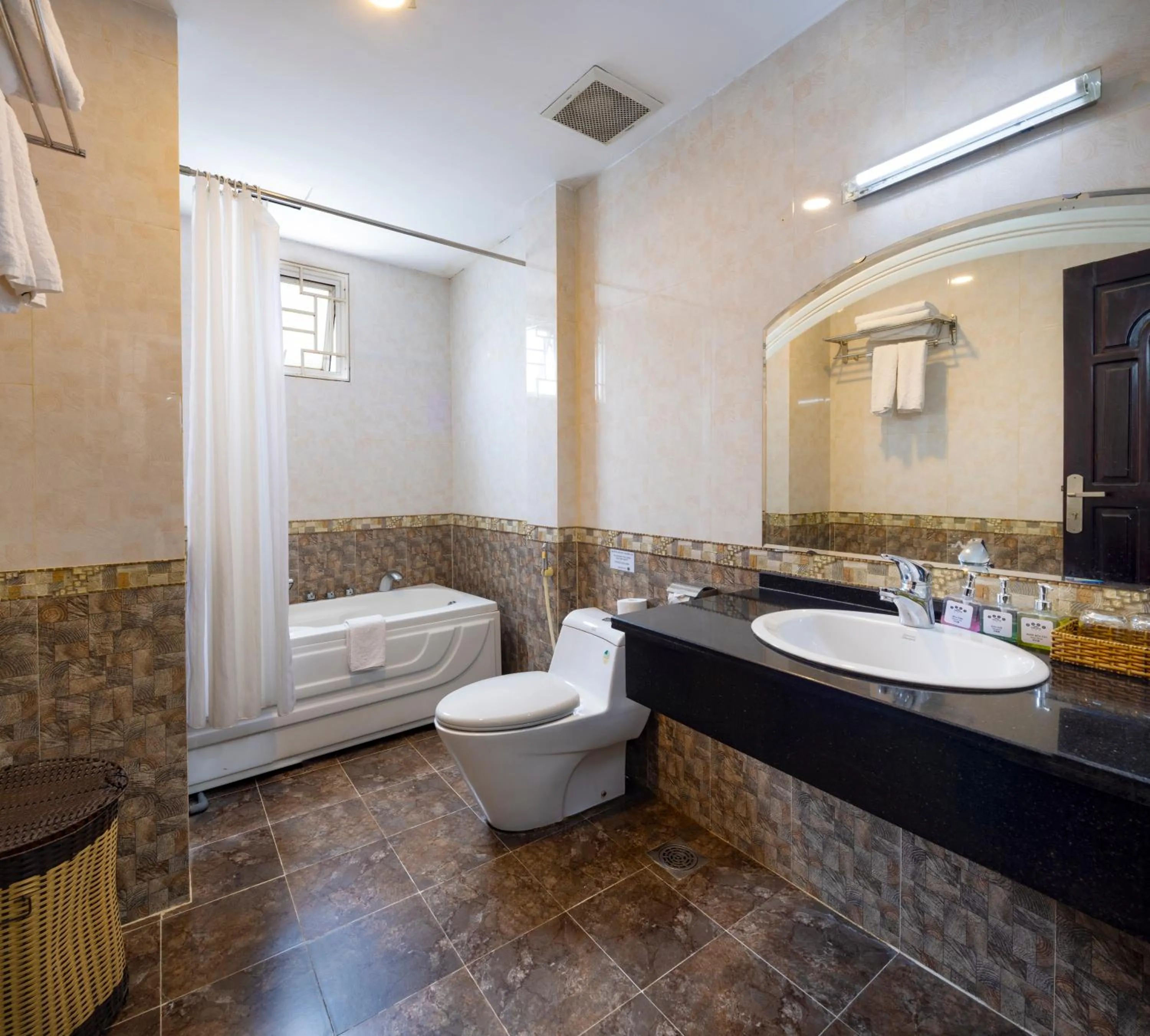 Toilet in Boss Palace Hotel