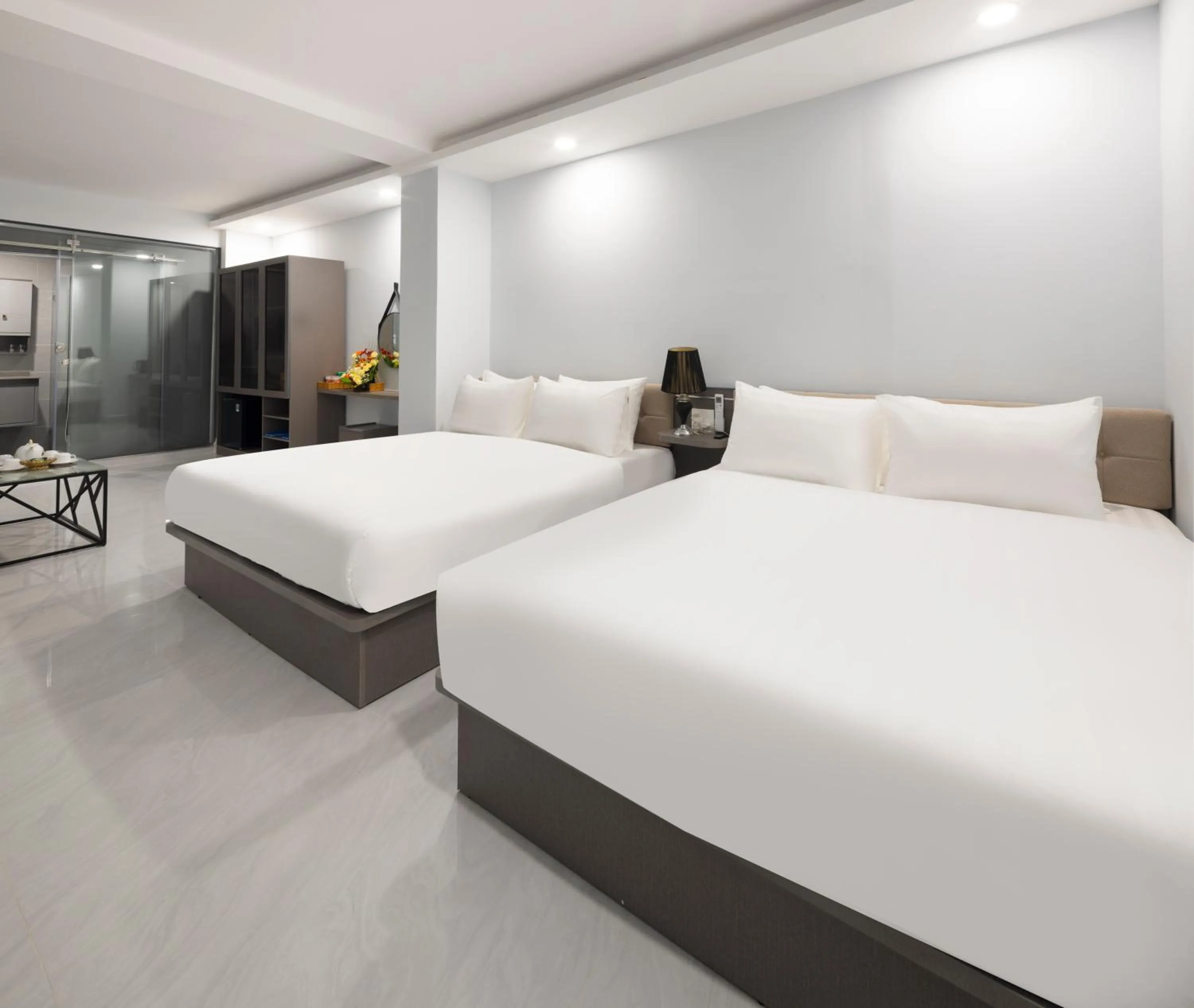 Bed in Boss Palace Hotel