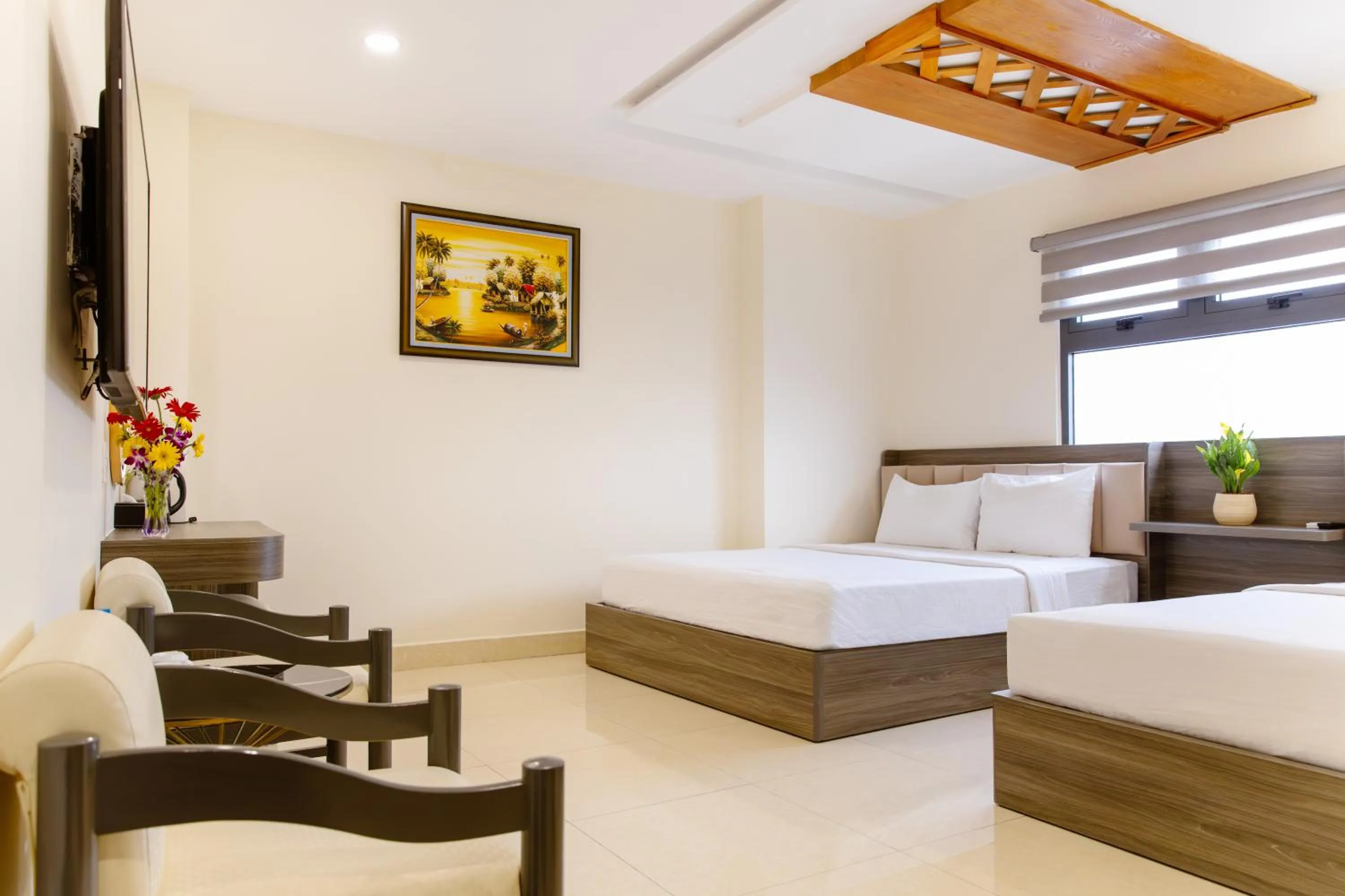 Bed in Boss Palace Hotel