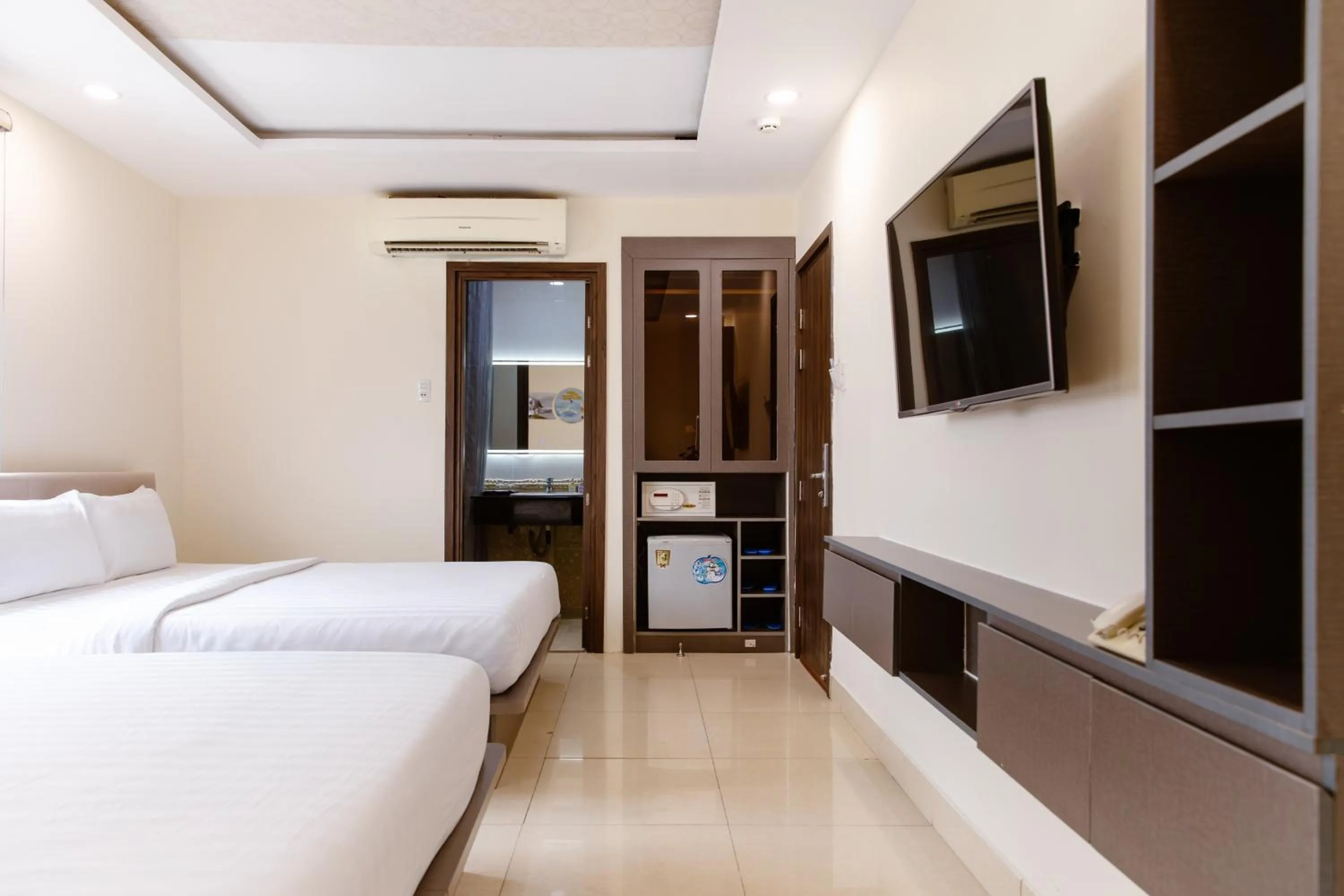 Bed in Boss Palace Hotel