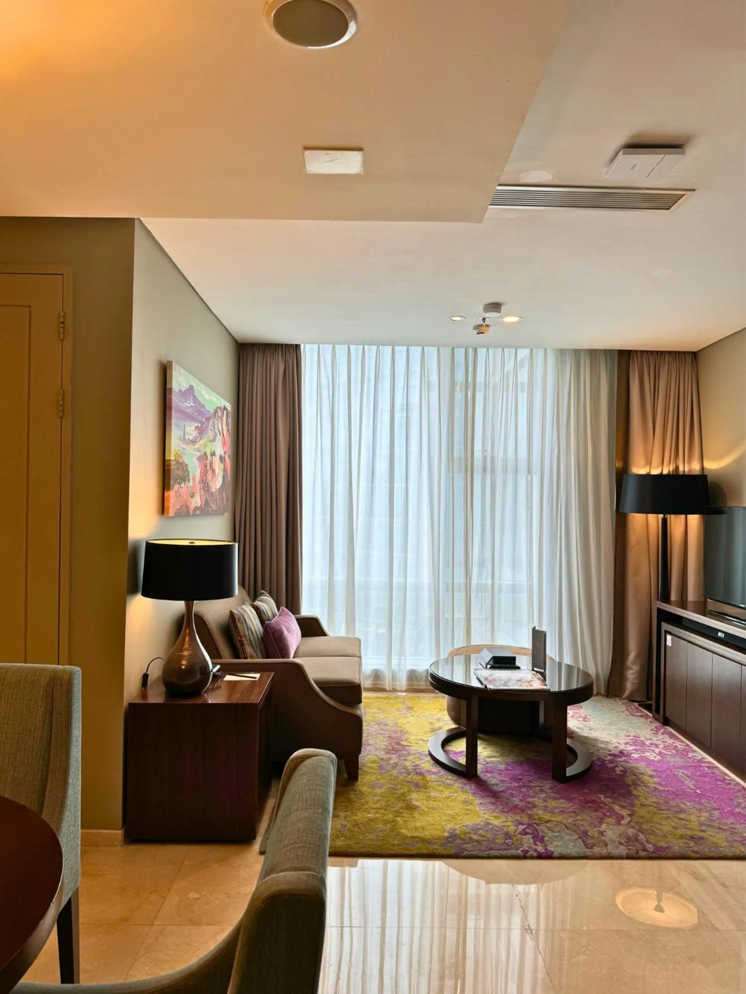 Living room, Bed in Ascott Kuningan Jakarta