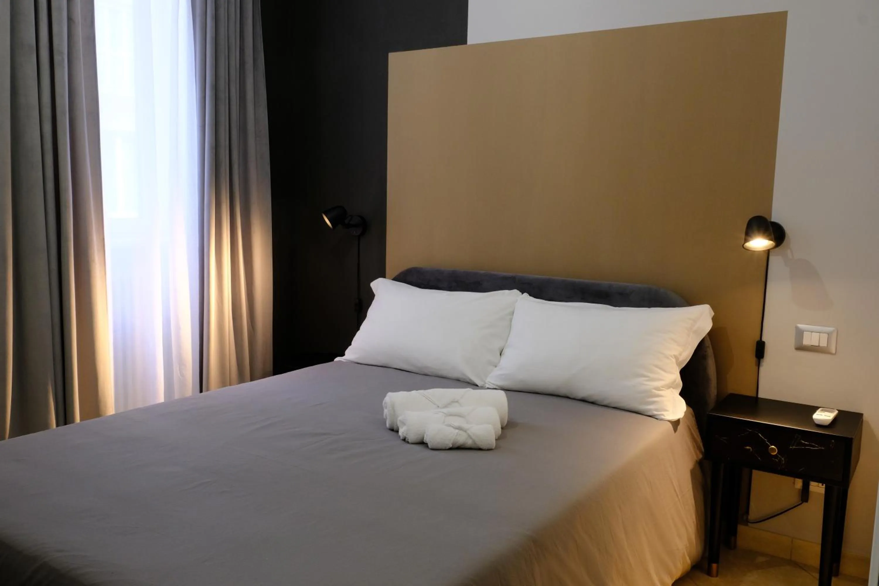 Bed in MATTEOTTI ROOMS