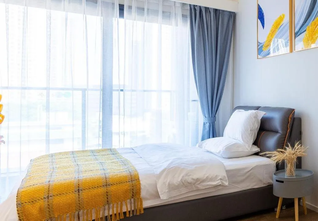 Bed in Guangzhou YuXiang Apartment - Guangzhou Pazhou International Convention and Exhibition Center