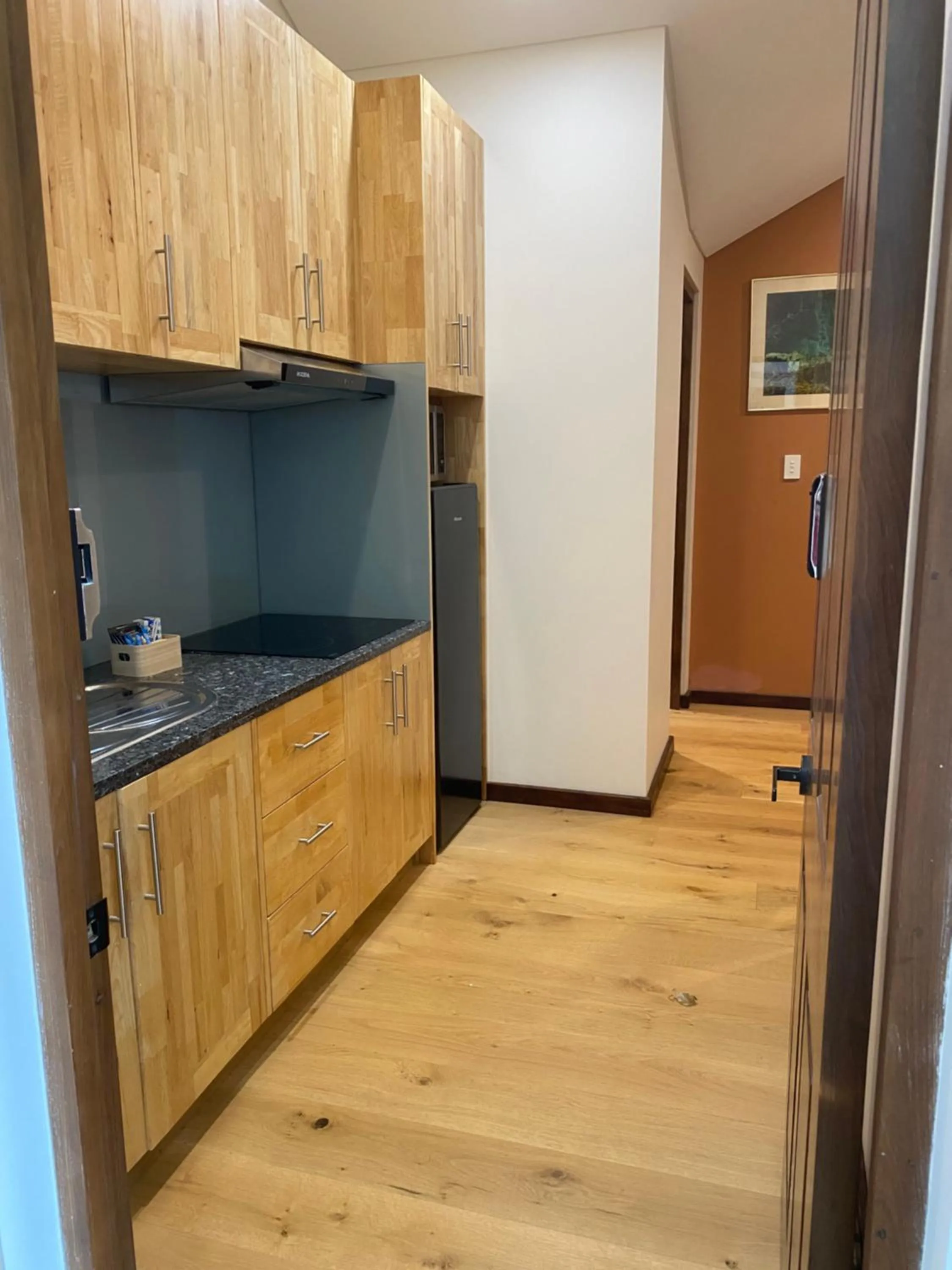 Kitchen or kitchenette in RIALTO SUITES Fremantle