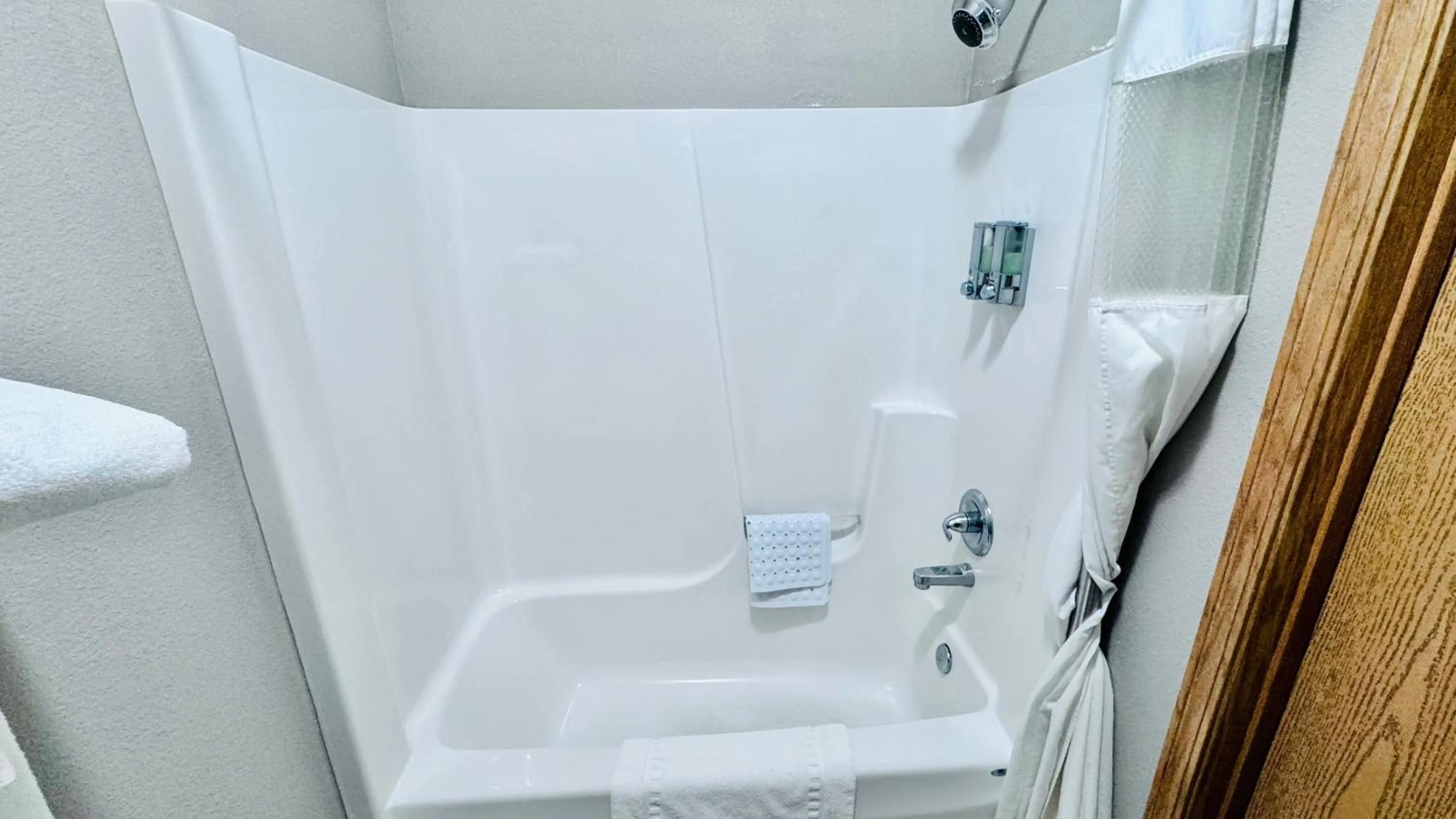 Bathroom in Garner INN & Suites