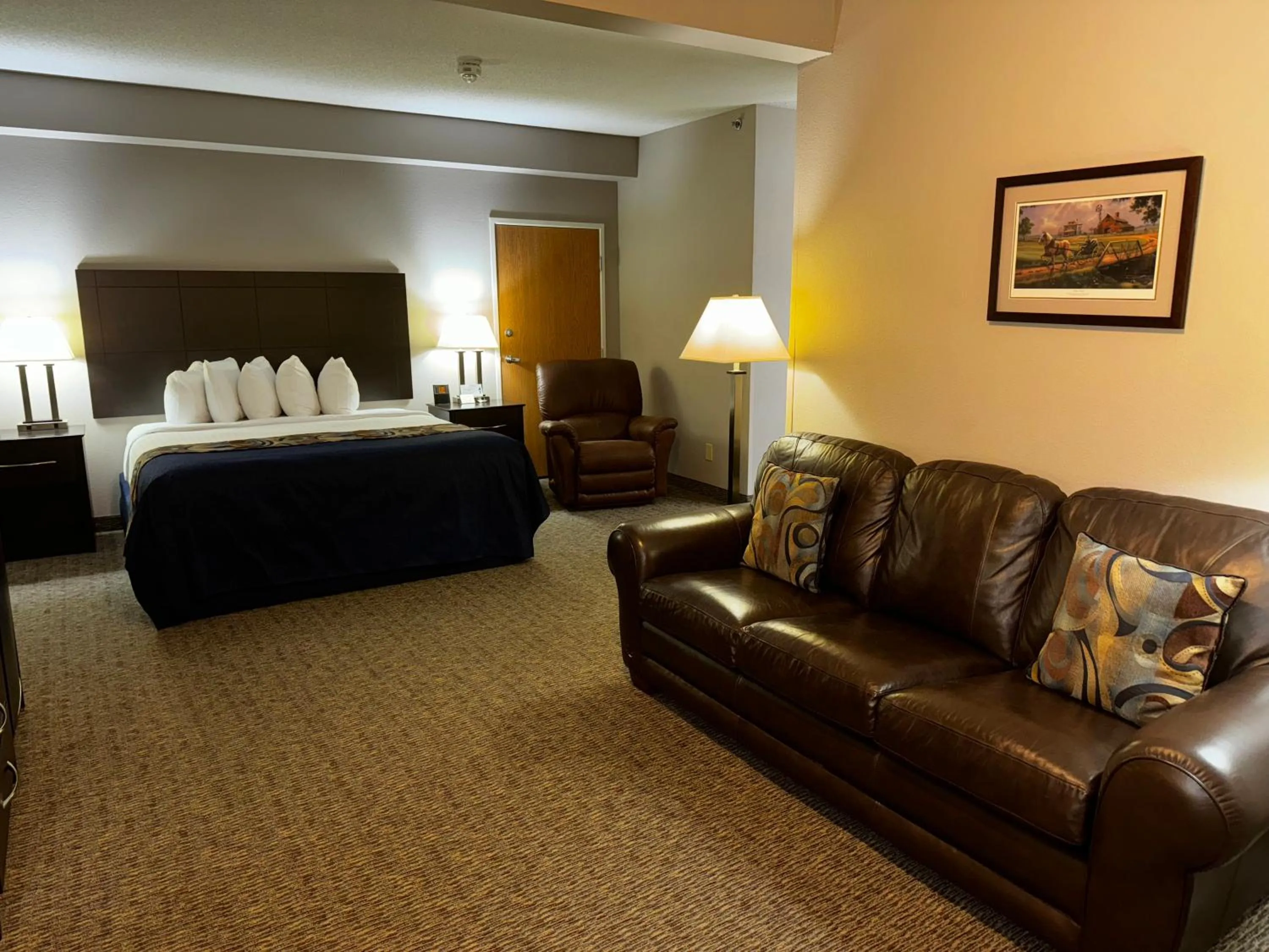 Bed in Garner INN & Suites