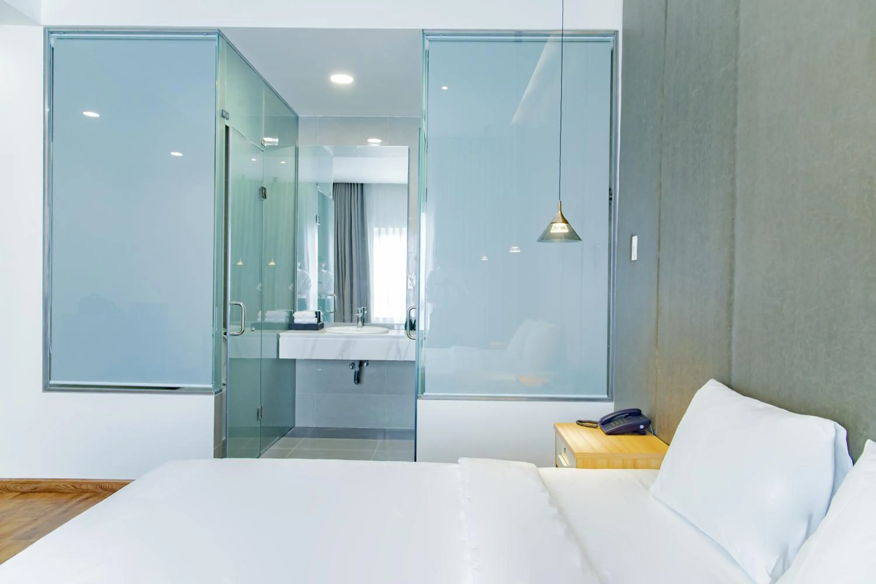 Bed in The Mansion Hotel Bien Hoa