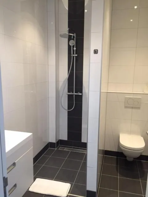 Bathroom in Strandhotel Bos en Duin