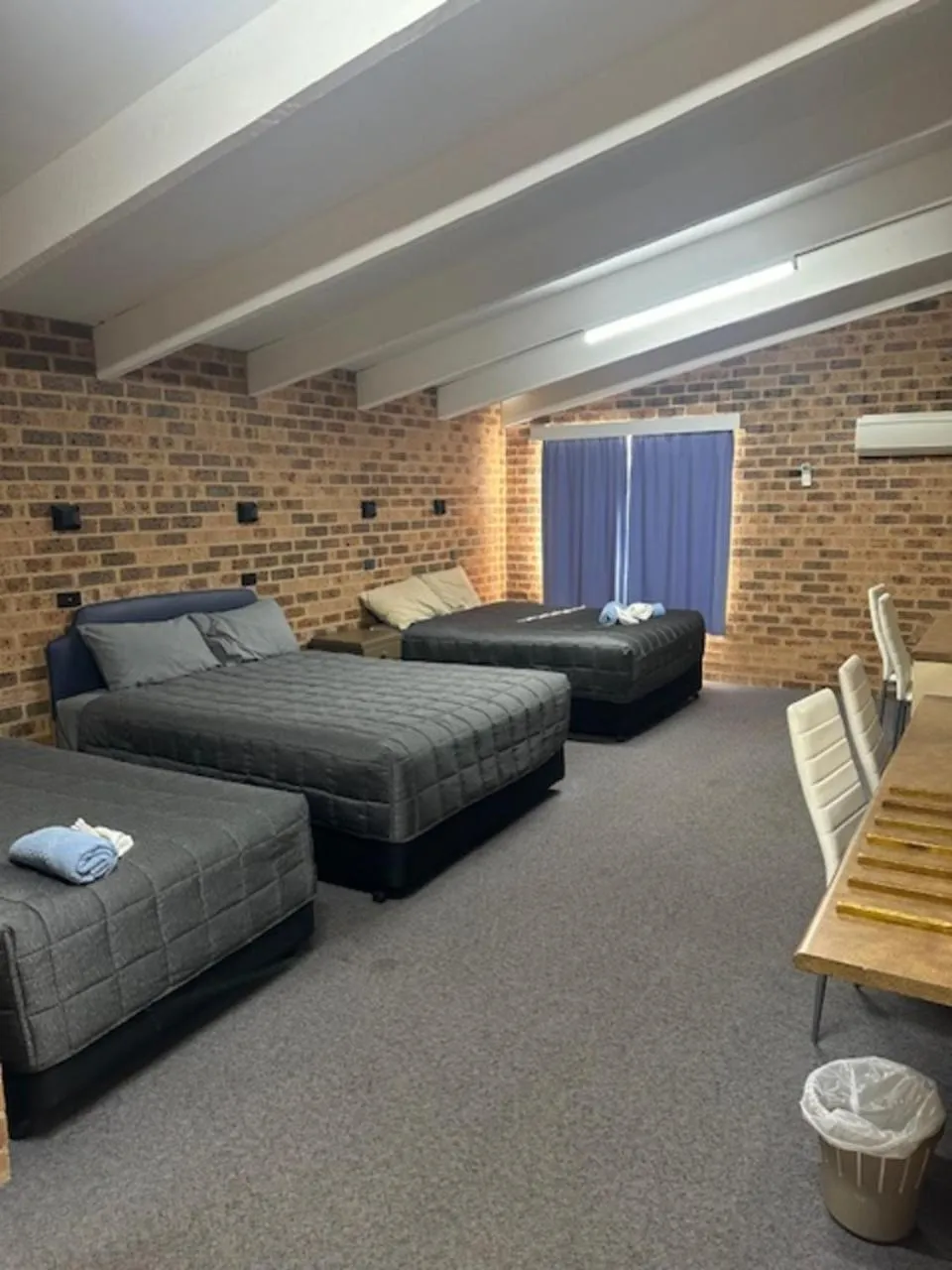 Bed in Clock Tower Motor Inn