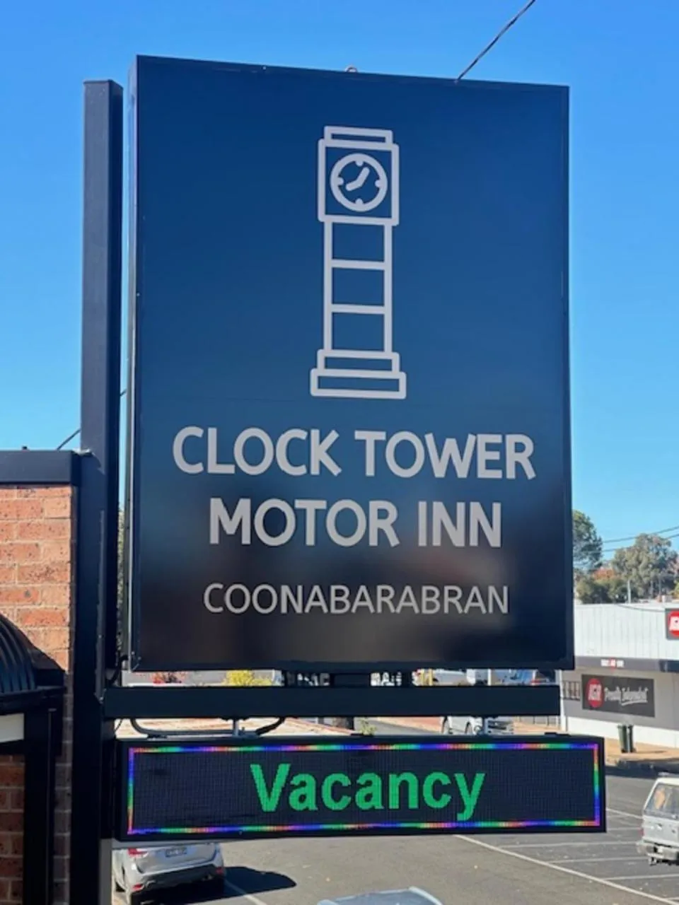 Property logo or sign in Clock Tower Motor Inn