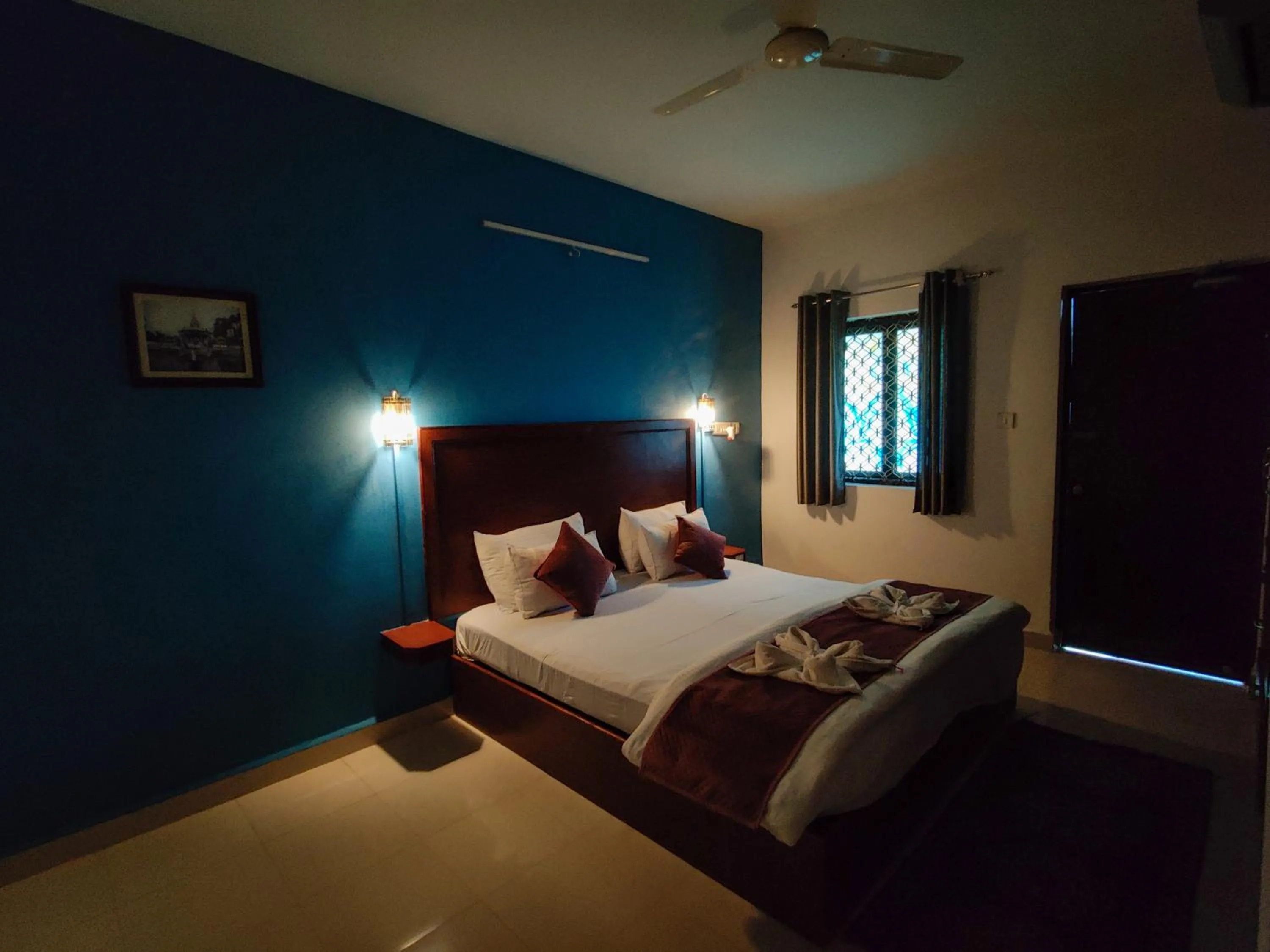 Bed in Vintage Beach Resort