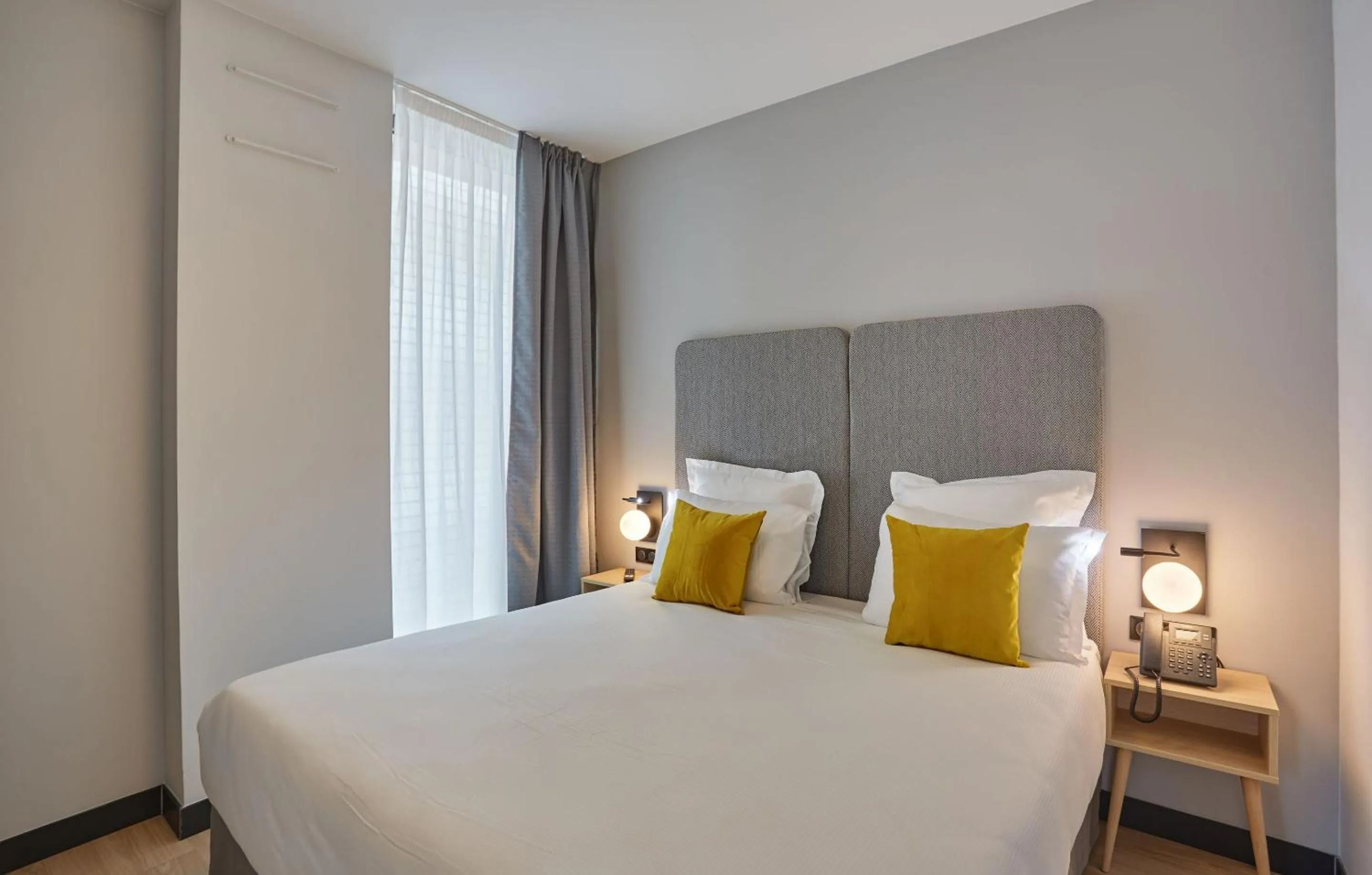 Bedroom, Bed in Appart'hôtel Odalys City - Nîmes Arènes - Palais des Congrès