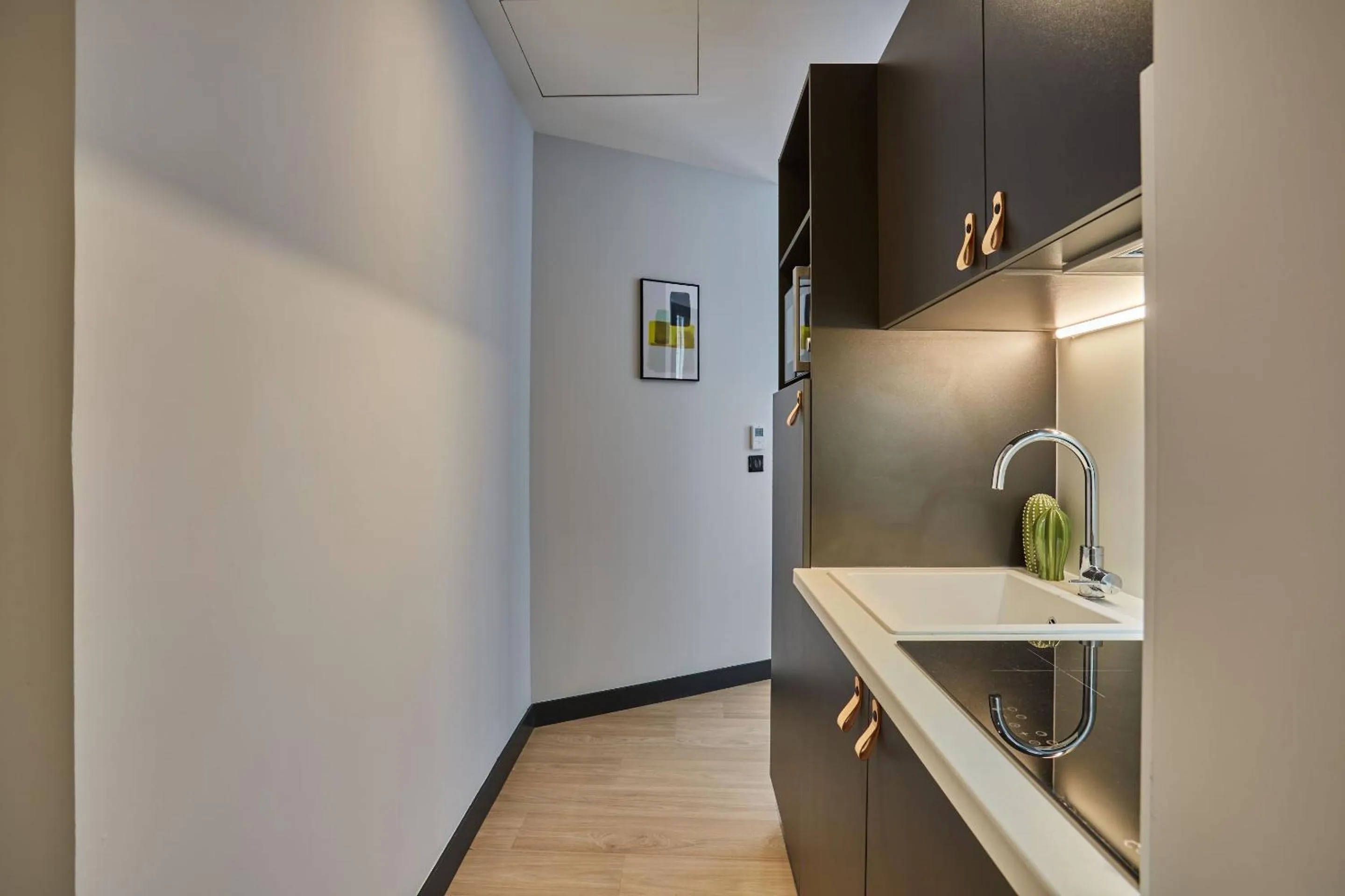 Kitchen or kitchenette in Appart'hôtel Odalys City - Nîmes Arènes - Palais des Congrès