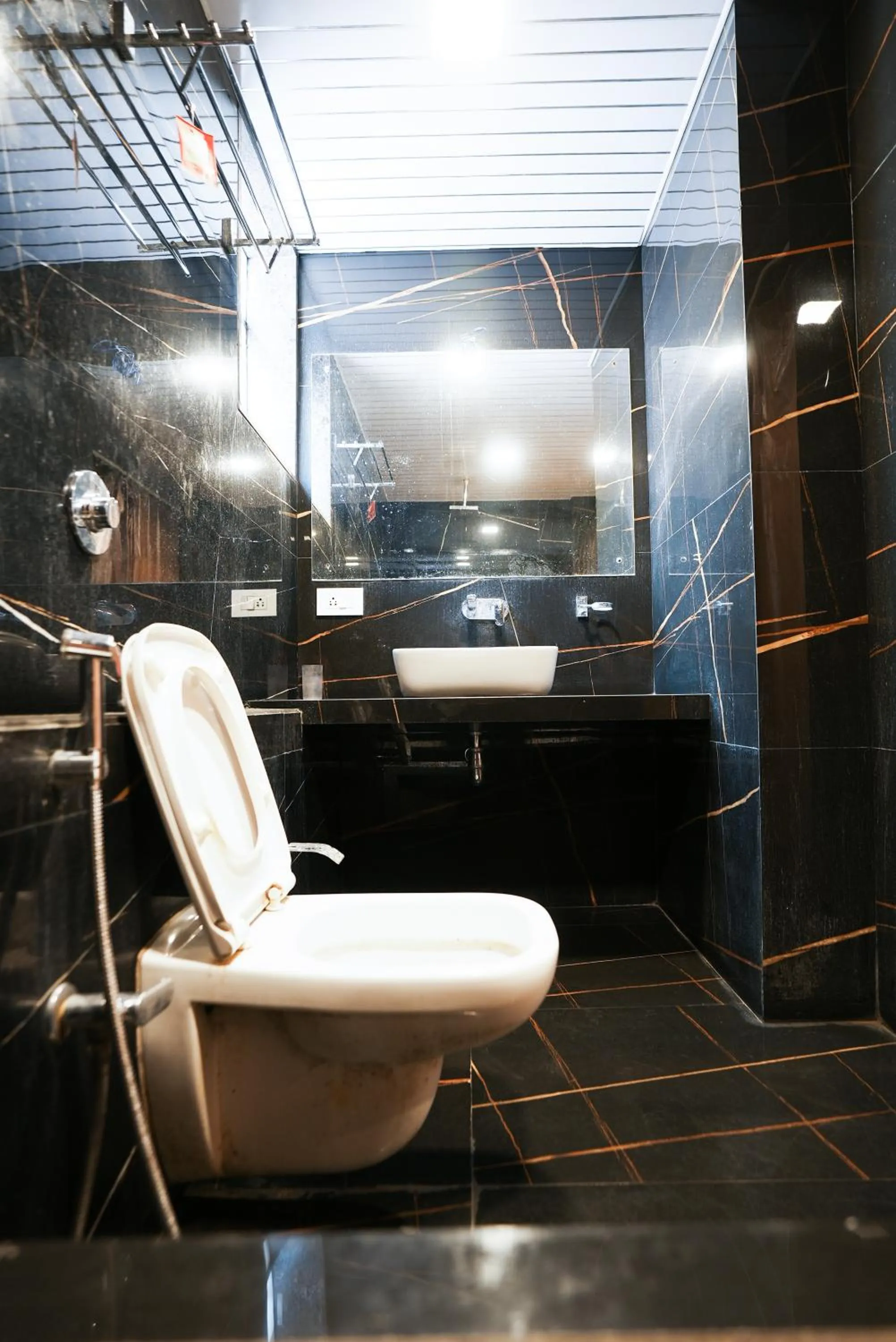 Bathroom in Hotel Sai Executive Near Holy Cross Church Mahabaleshwar
