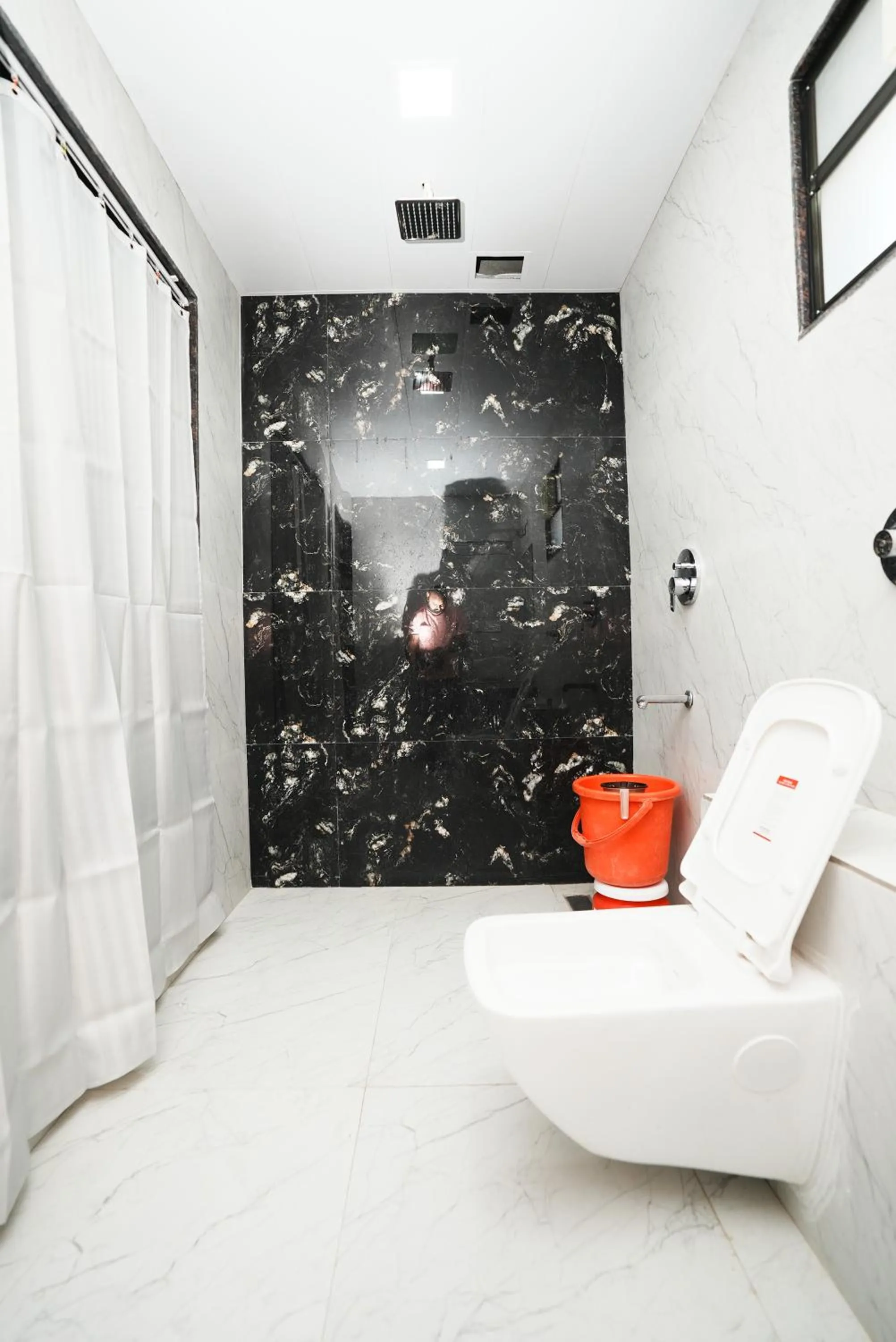 Bathroom in Hotel Sai Executive Near Holy Cross Church Mahabaleshwar