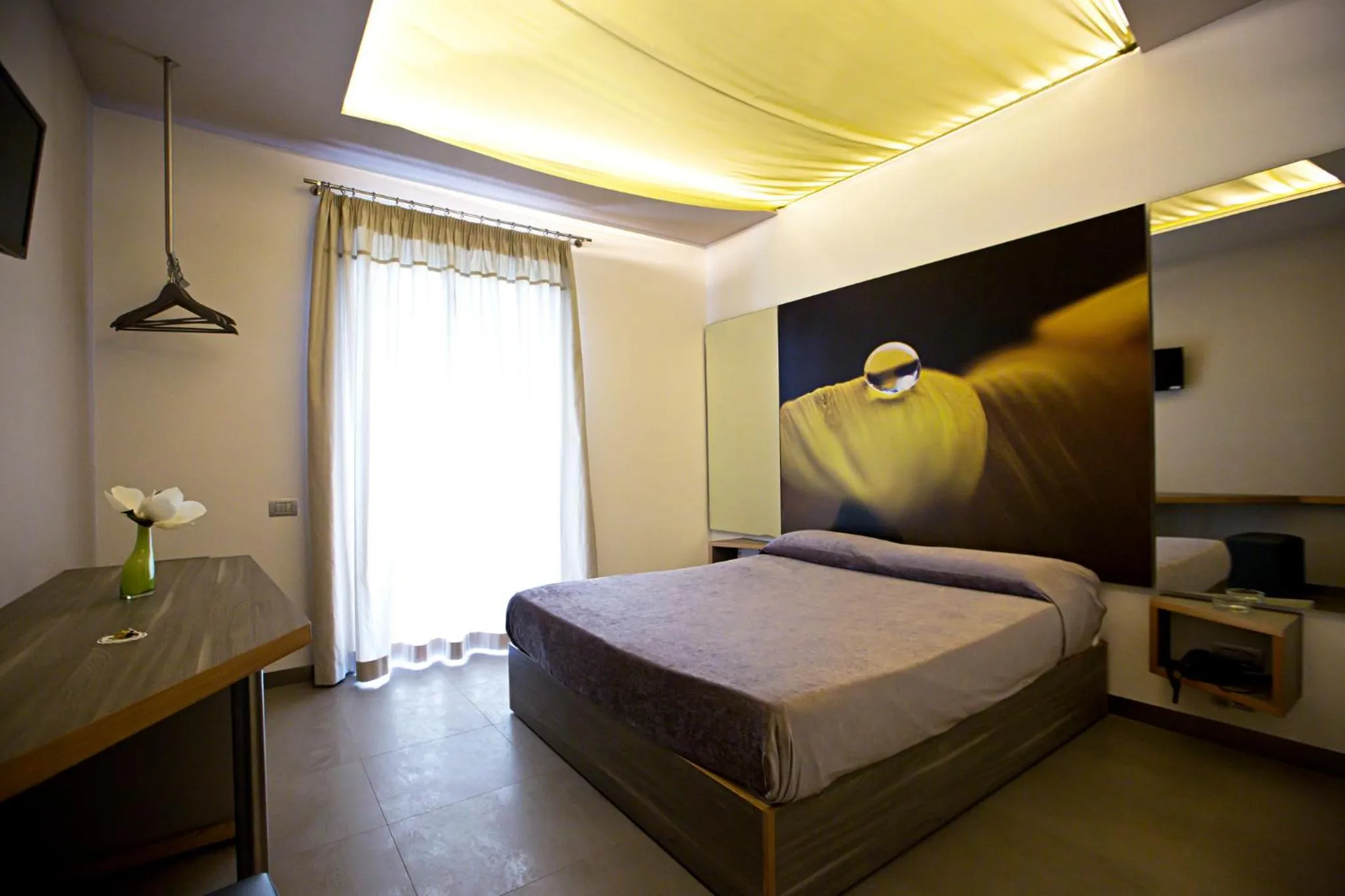 Property building, Bed in Hotel Tiro a Volo