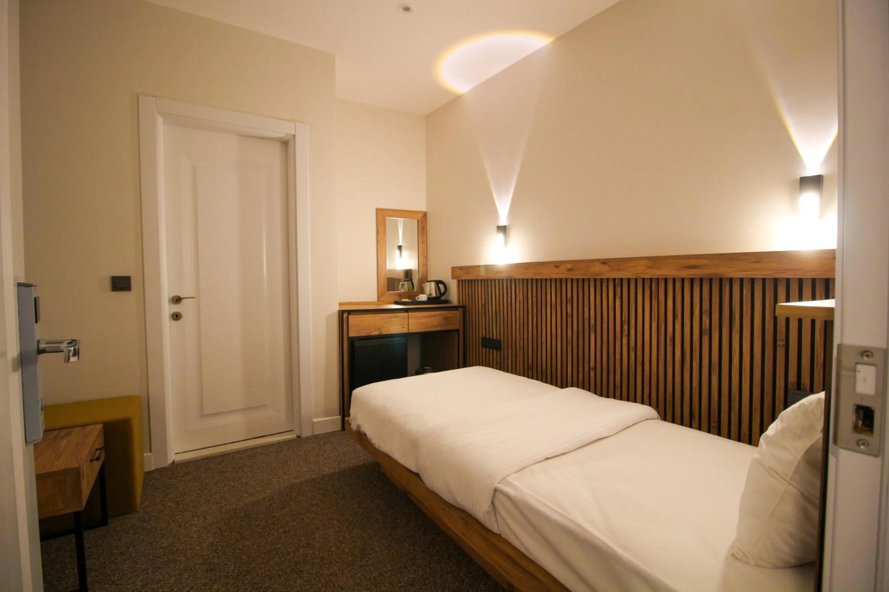 Bed in Kaya Hotel SAW