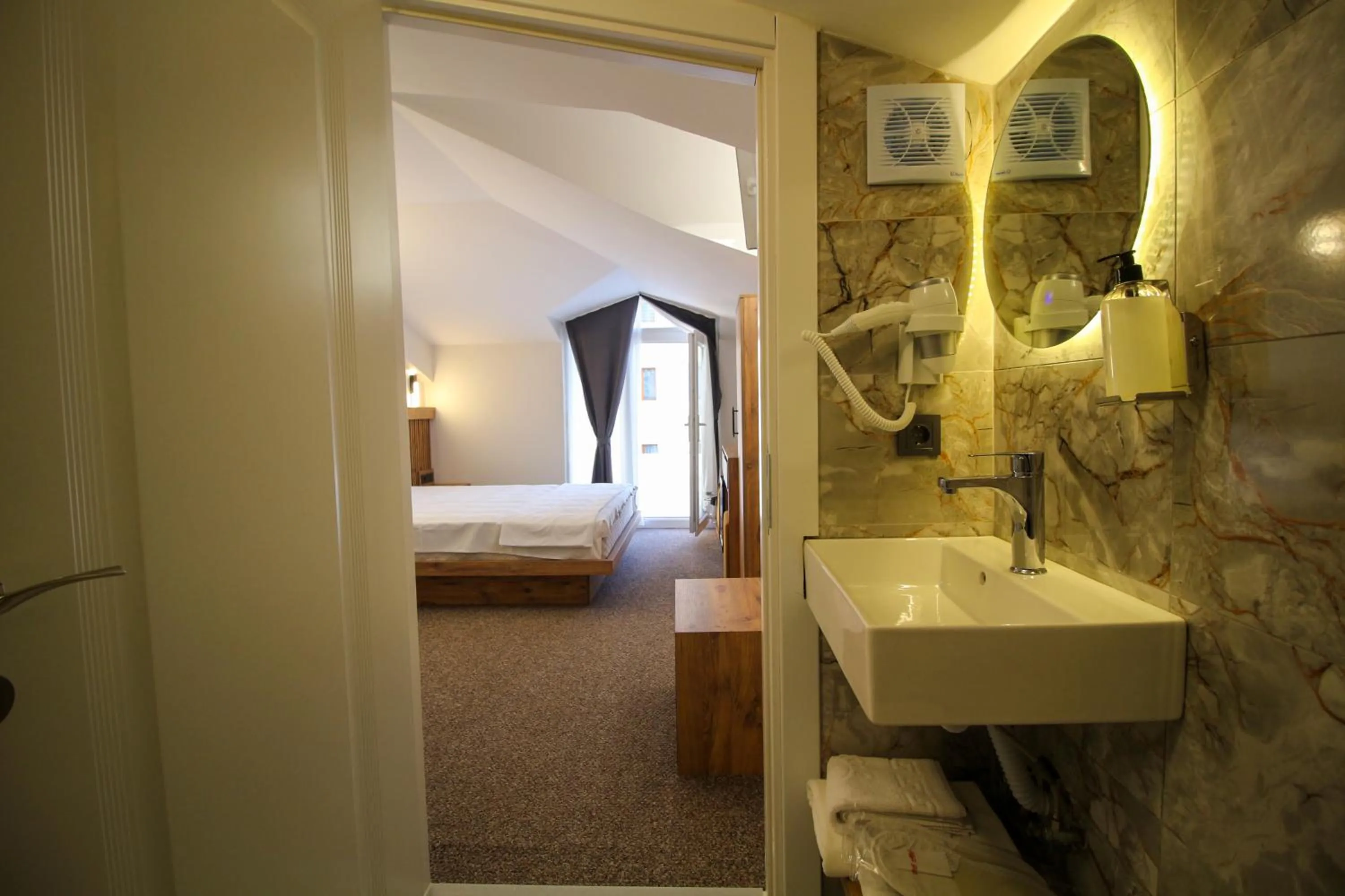 Bed in Kaya Hotel SAW