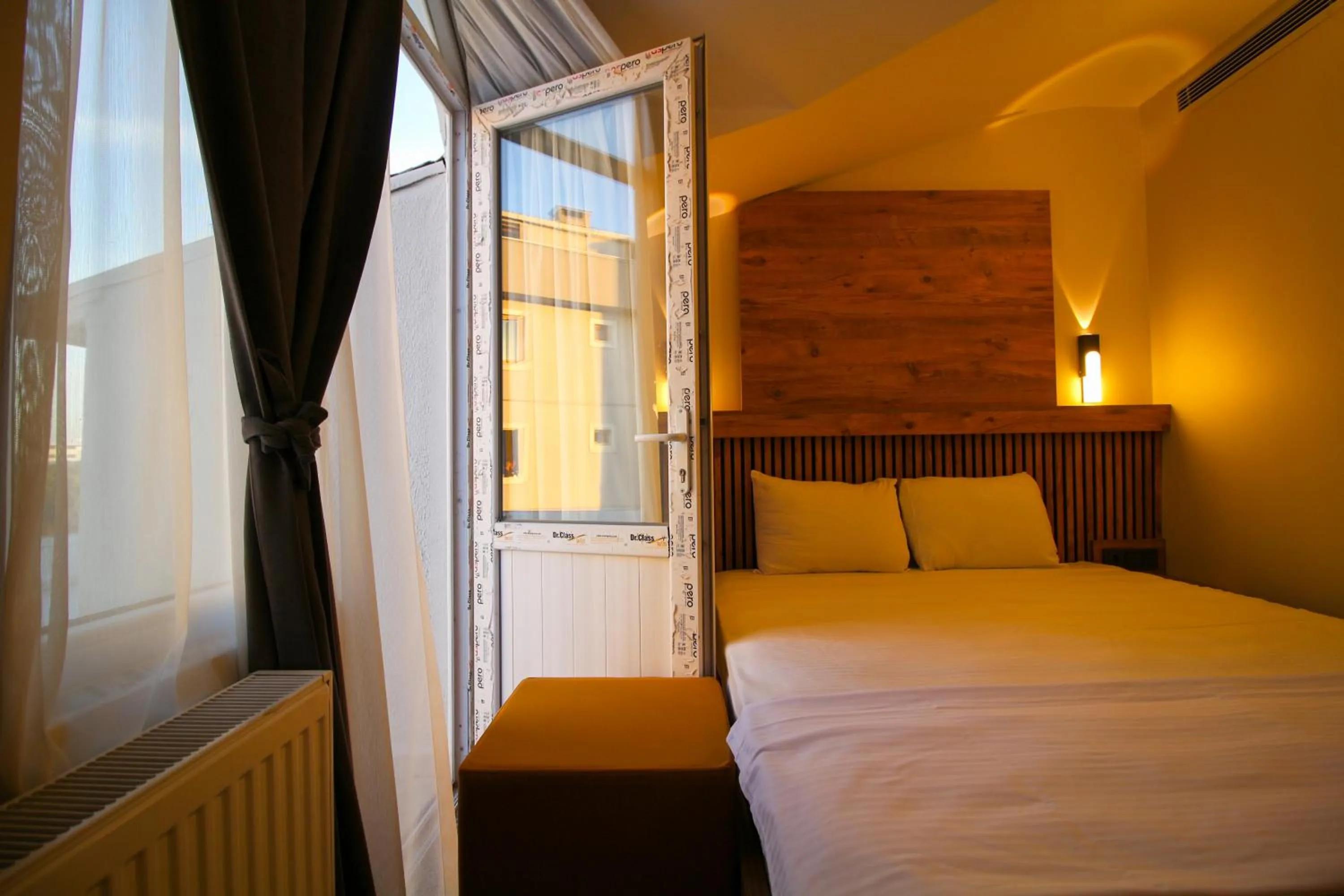 Bed in Kaya Hotel SAW