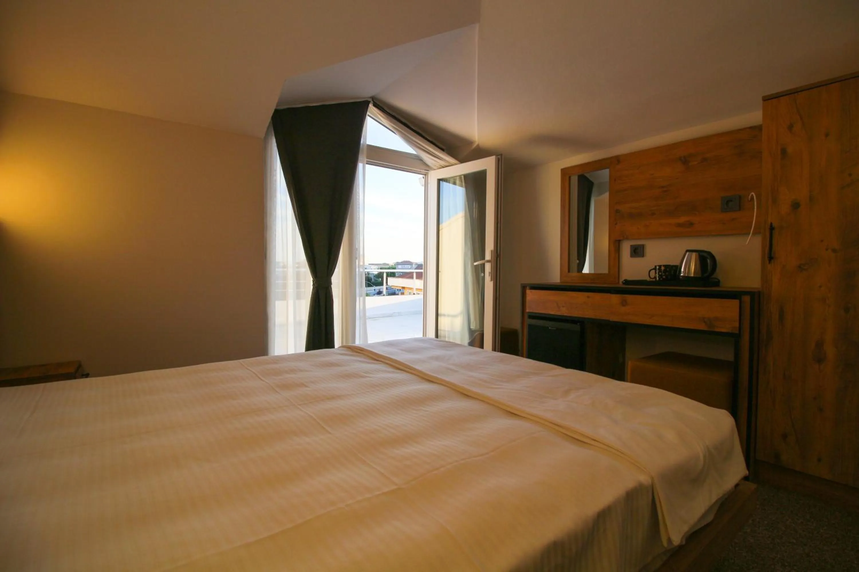 Bed in Kaya Hotel SAW