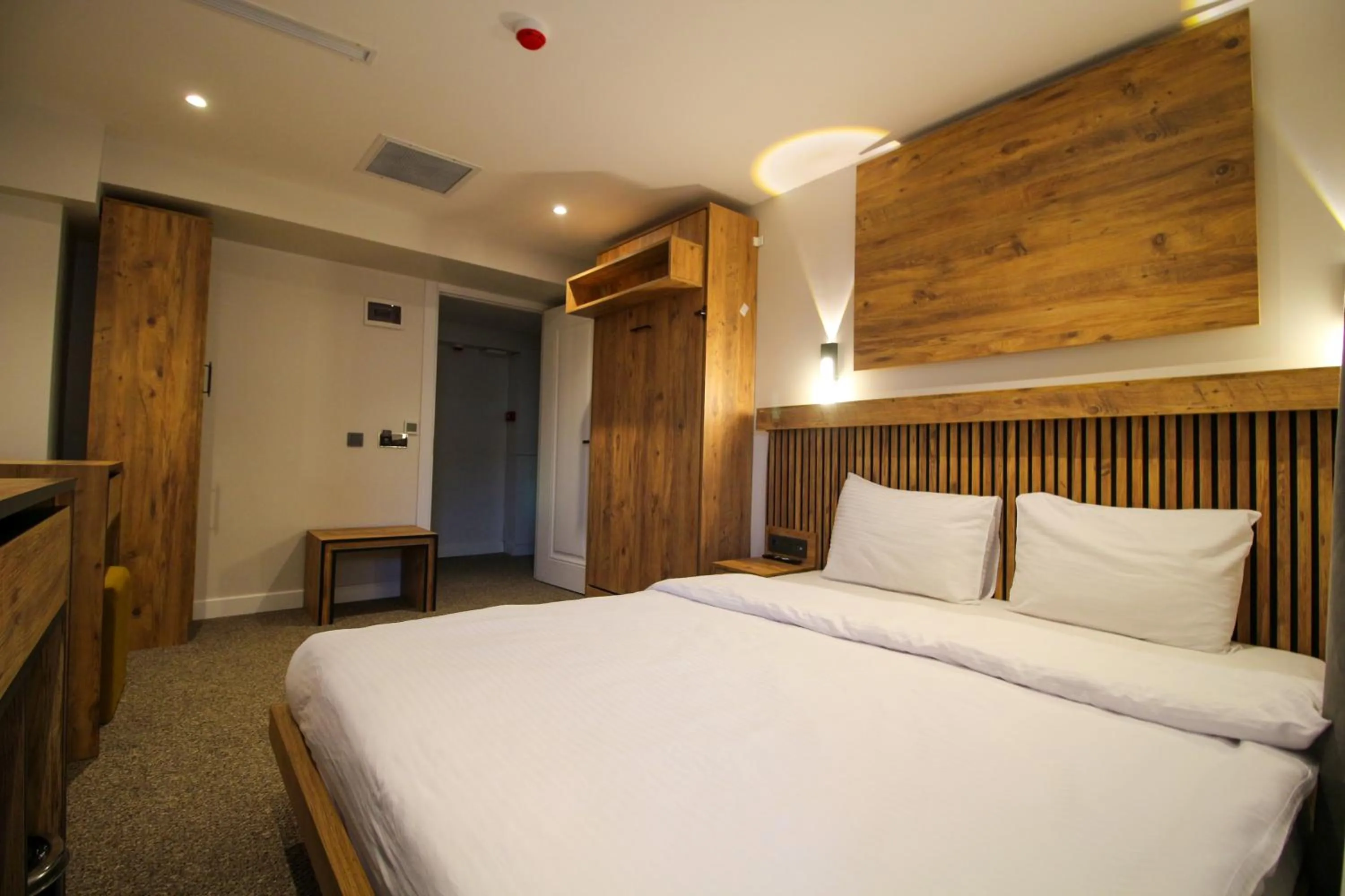 Bed in Kaya Hotel SAW