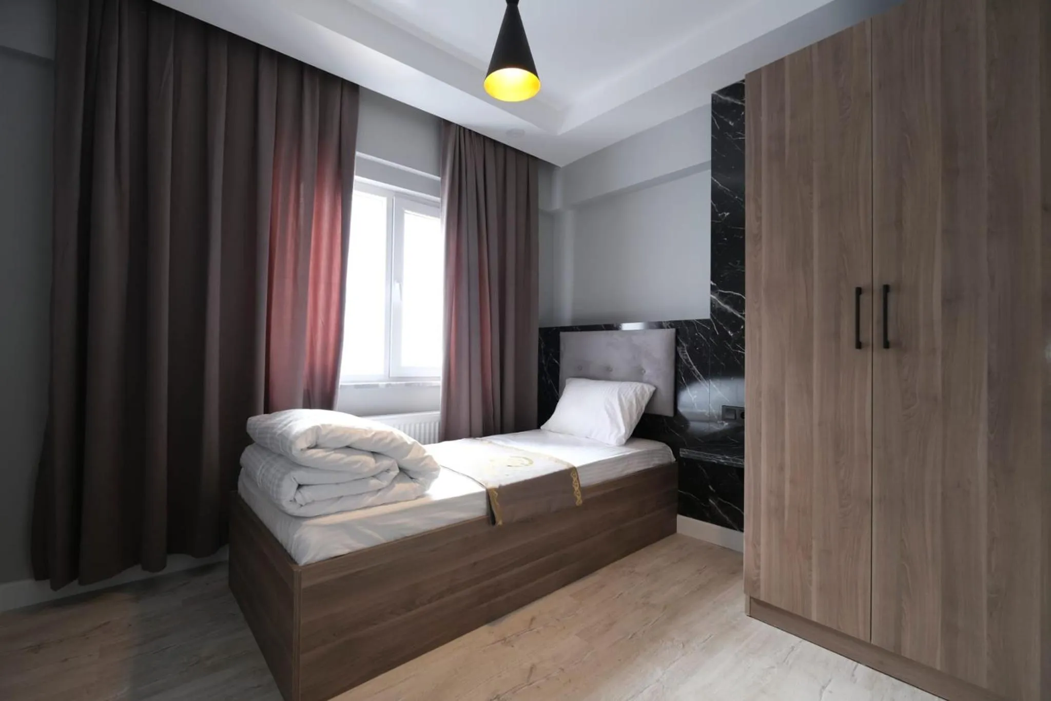 Bed in Cevvo Hotel