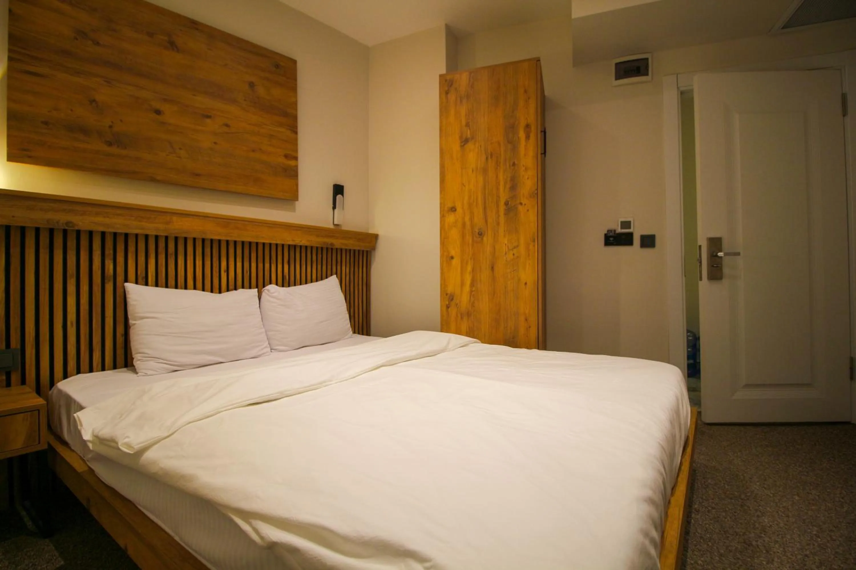 Bed in Kaya Hotel SAW