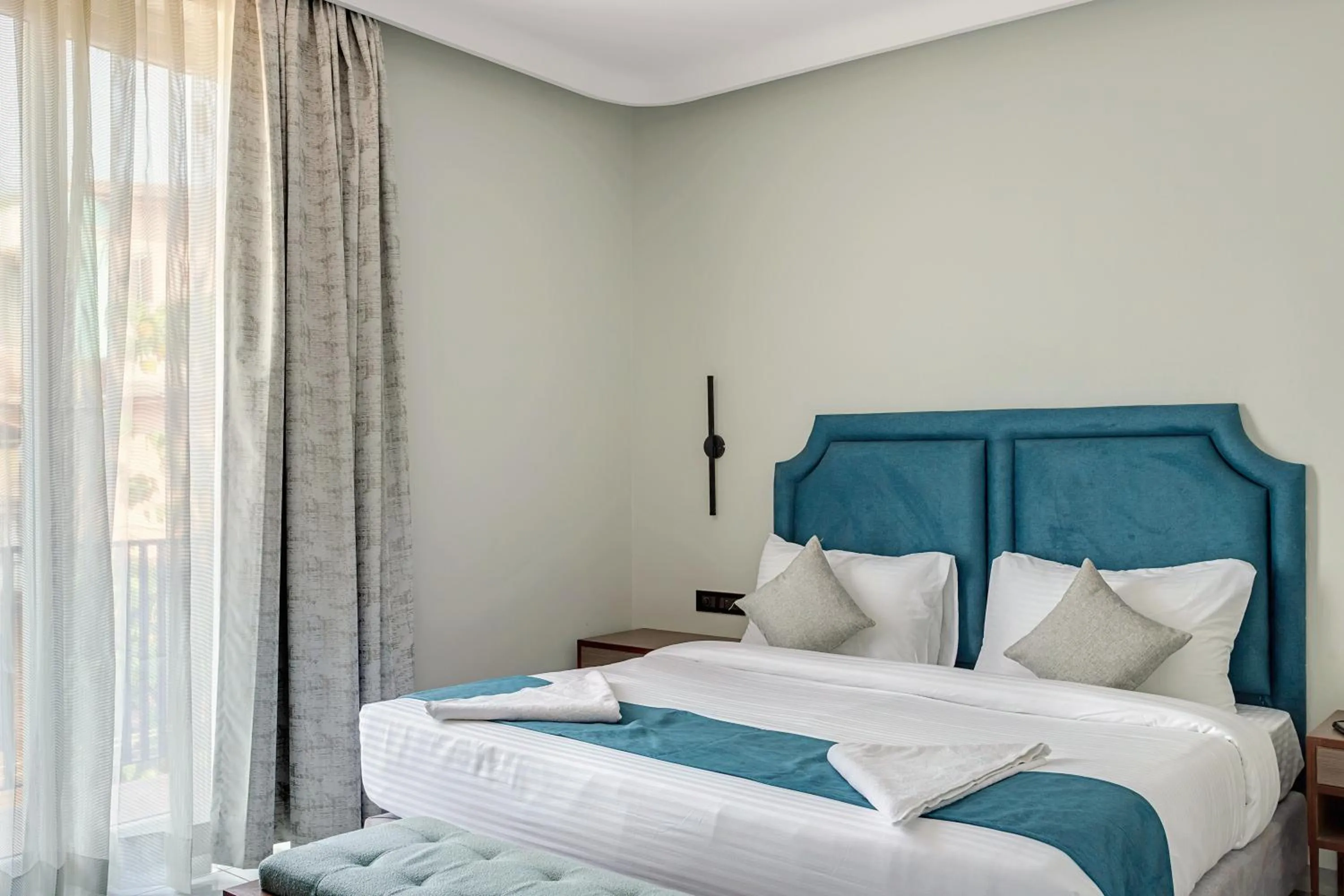 Photo of the whole room, Bed in Skon Baga Bliss Hotel by Orion Hotels