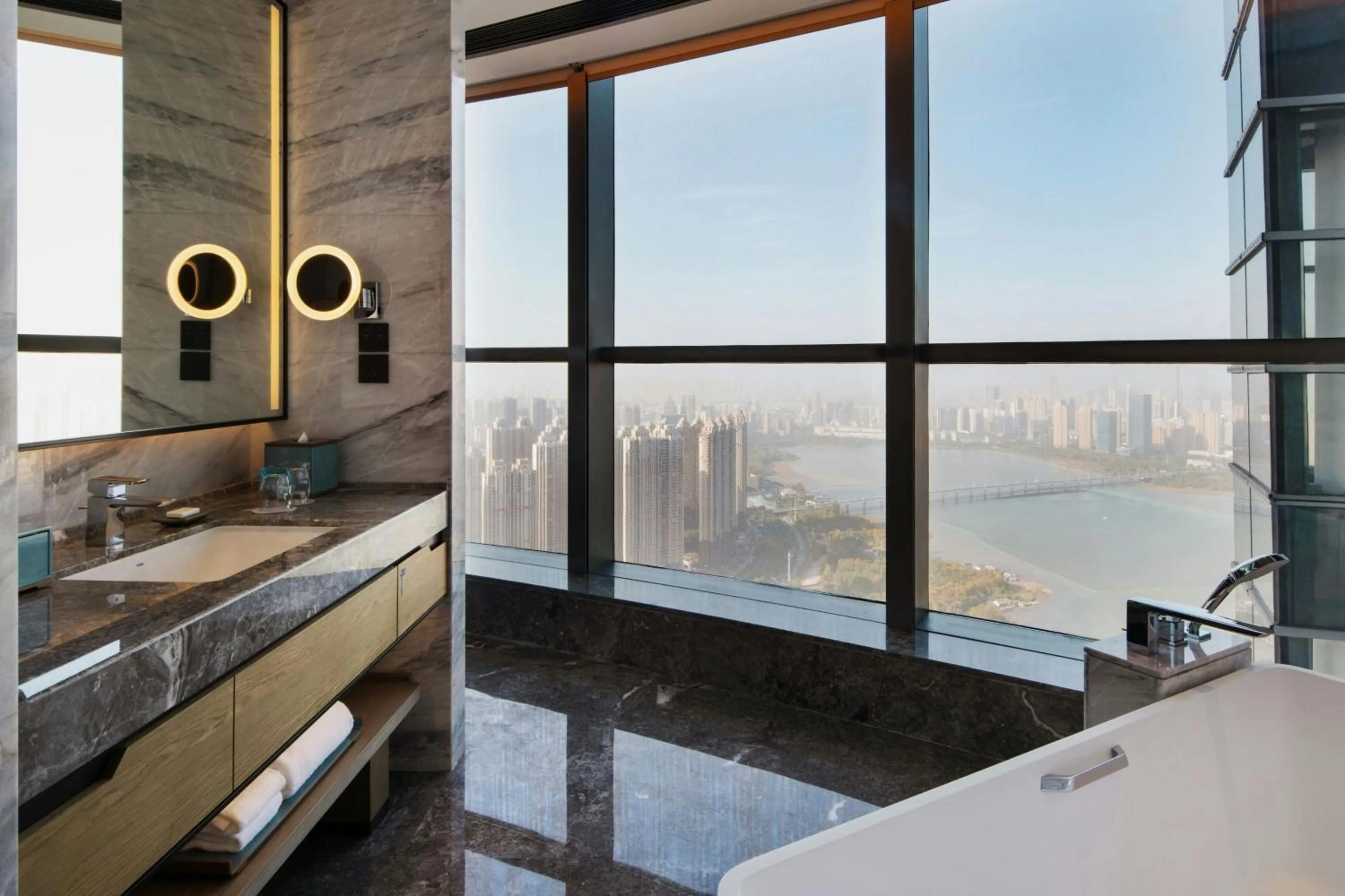 Bathroom, Bed in Wuhan Marriott Hotel Wuchang