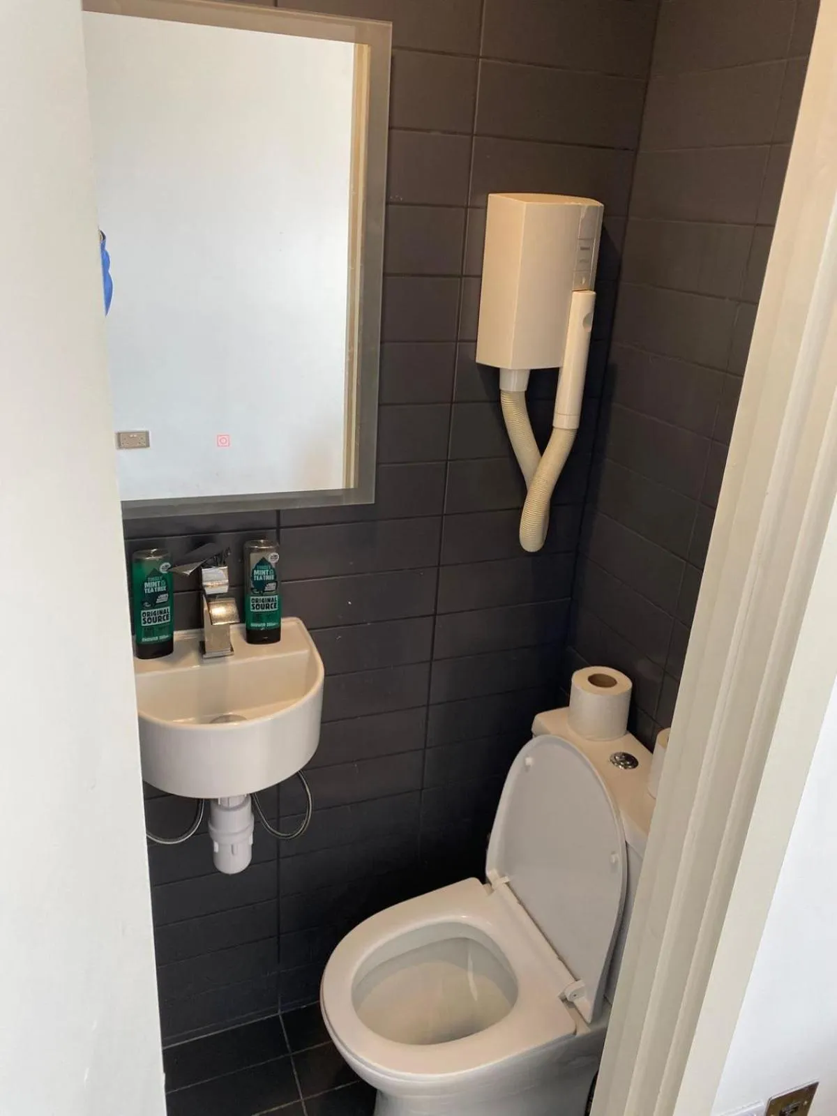 Bathroom in Exhibition Court Hotel 4