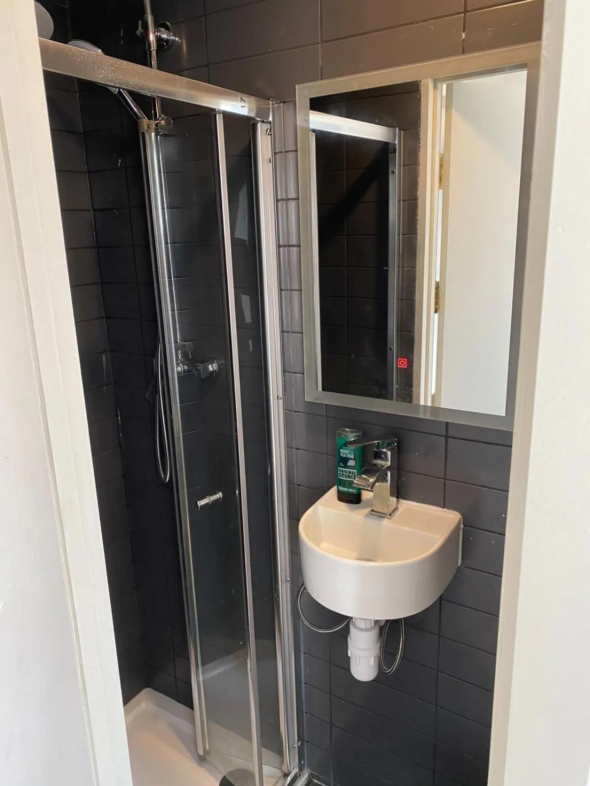 Bathroom in Exhibition Court Hotel 4