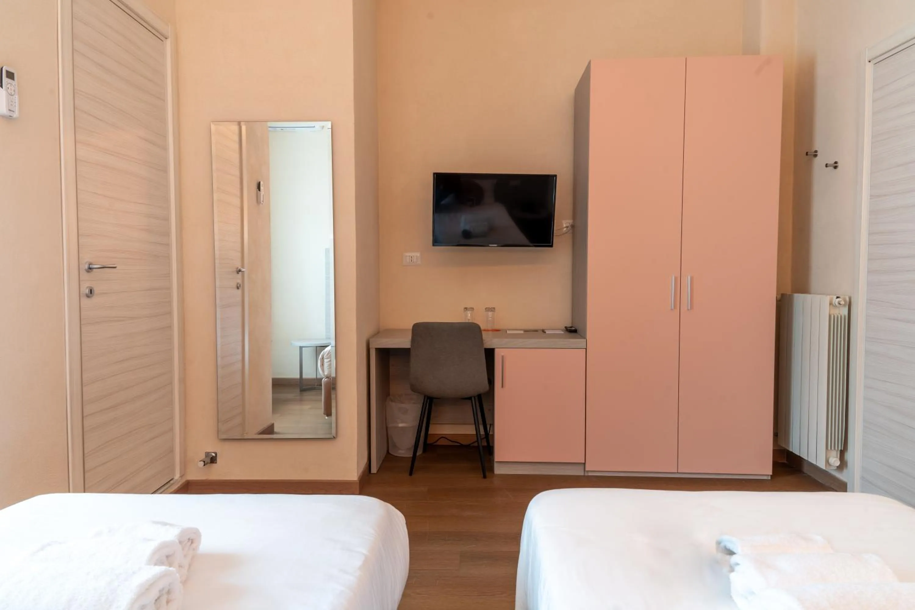 Bed in THE SUN HOTEL BOUTIQUE NAPOLI