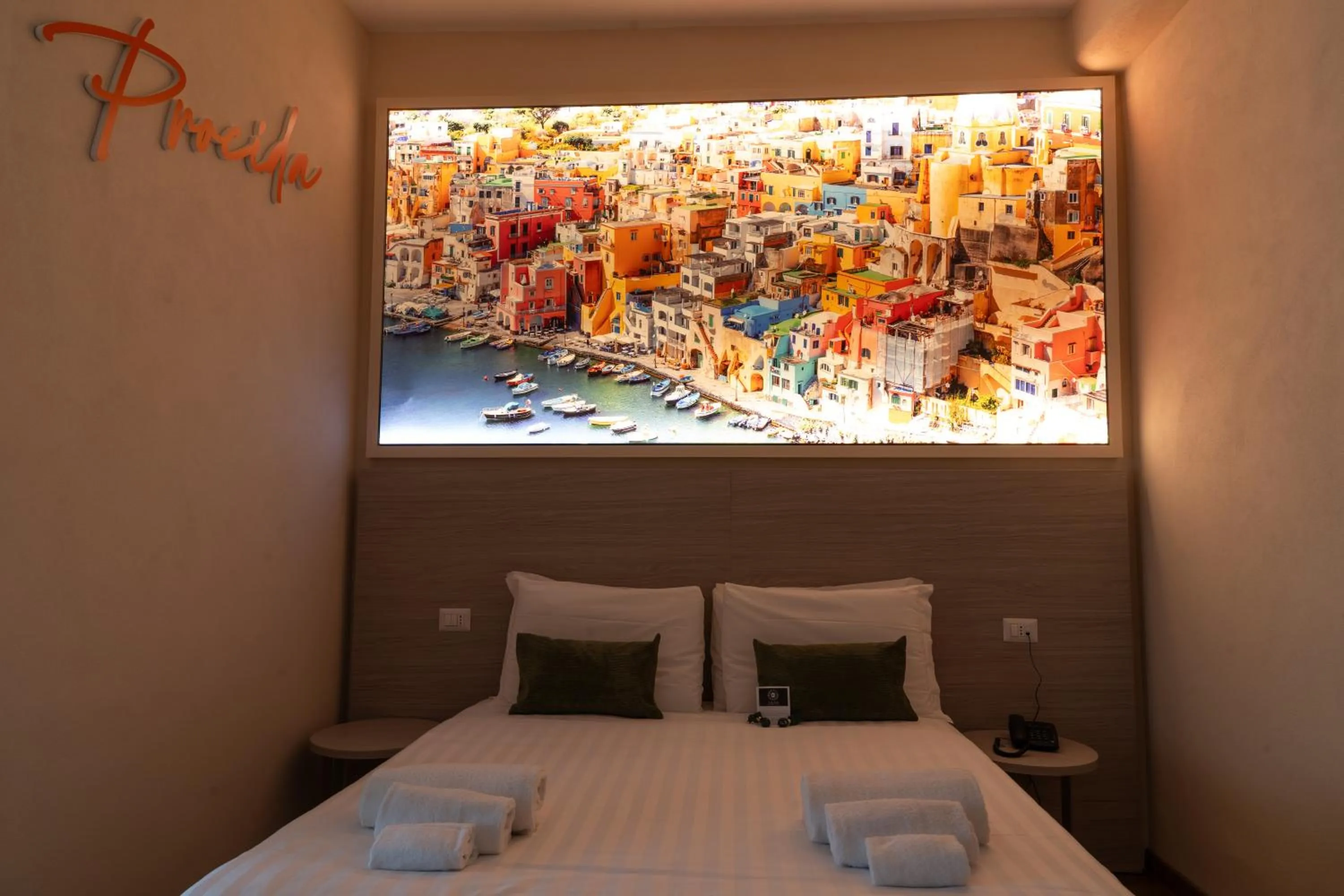 Bed in THE SUN HOTEL BOUTIQUE NAPOLI