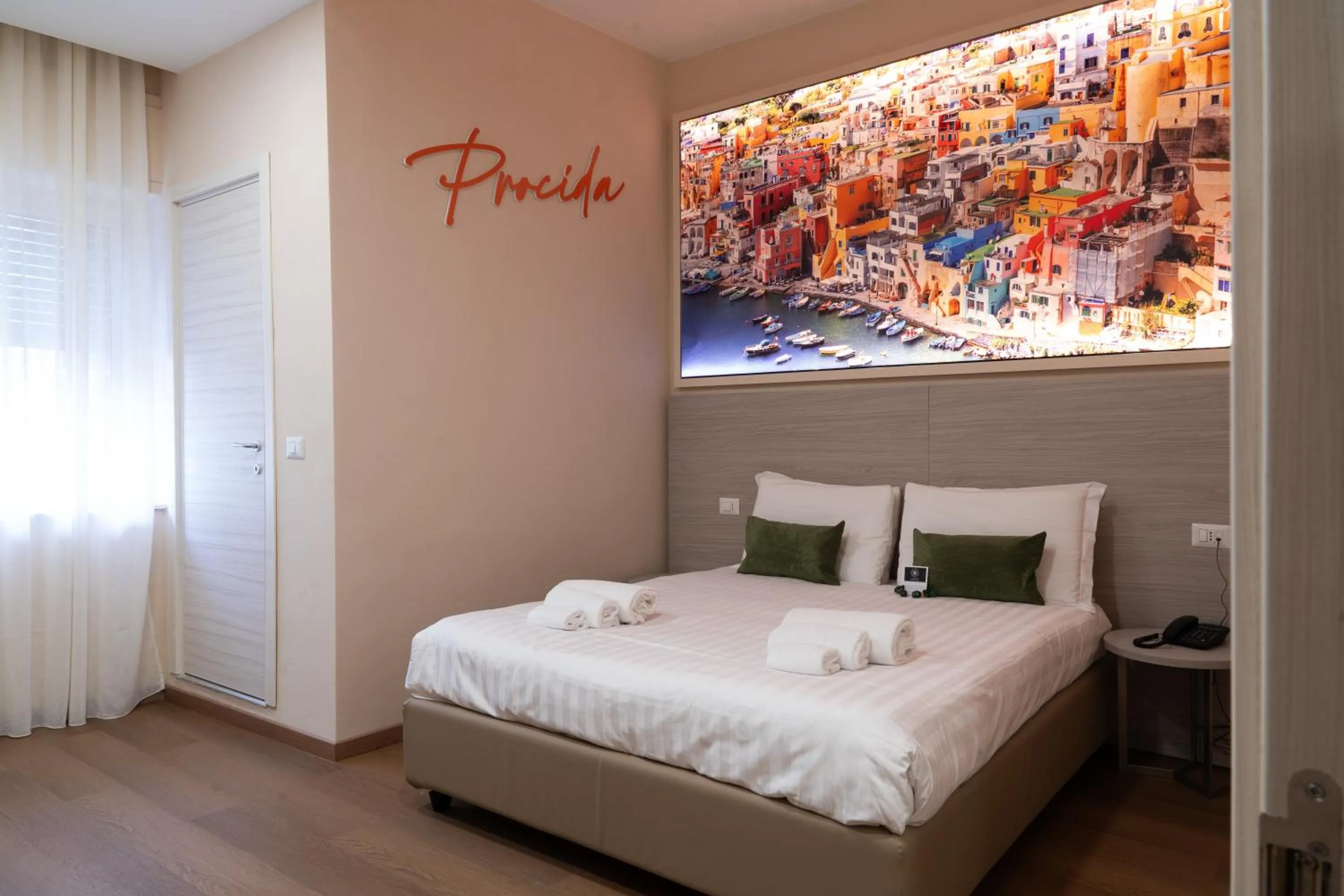 Bed in THE SUN HOTEL BOUTIQUE NAPOLI