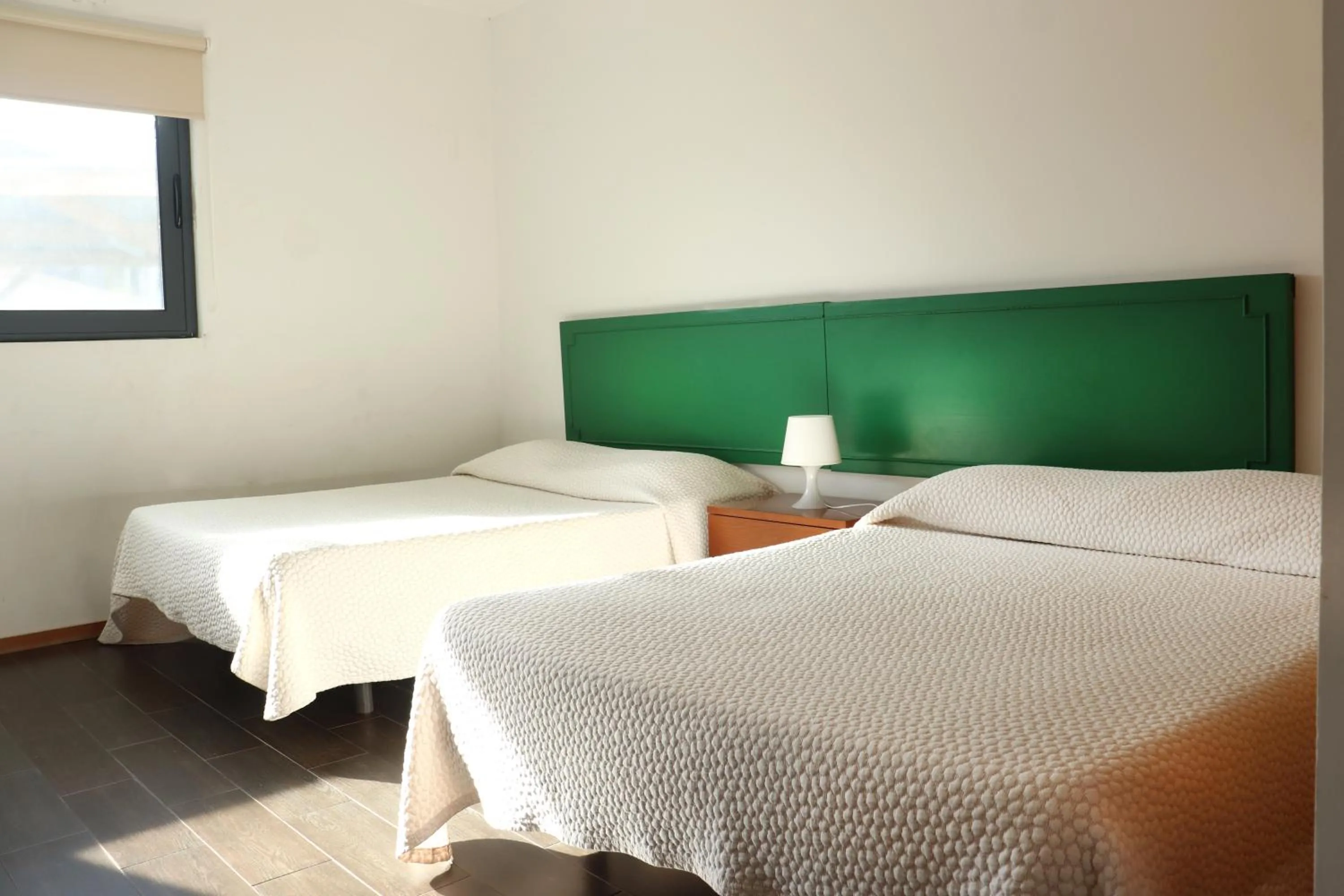 Bed in Faial Marina Apartments 1