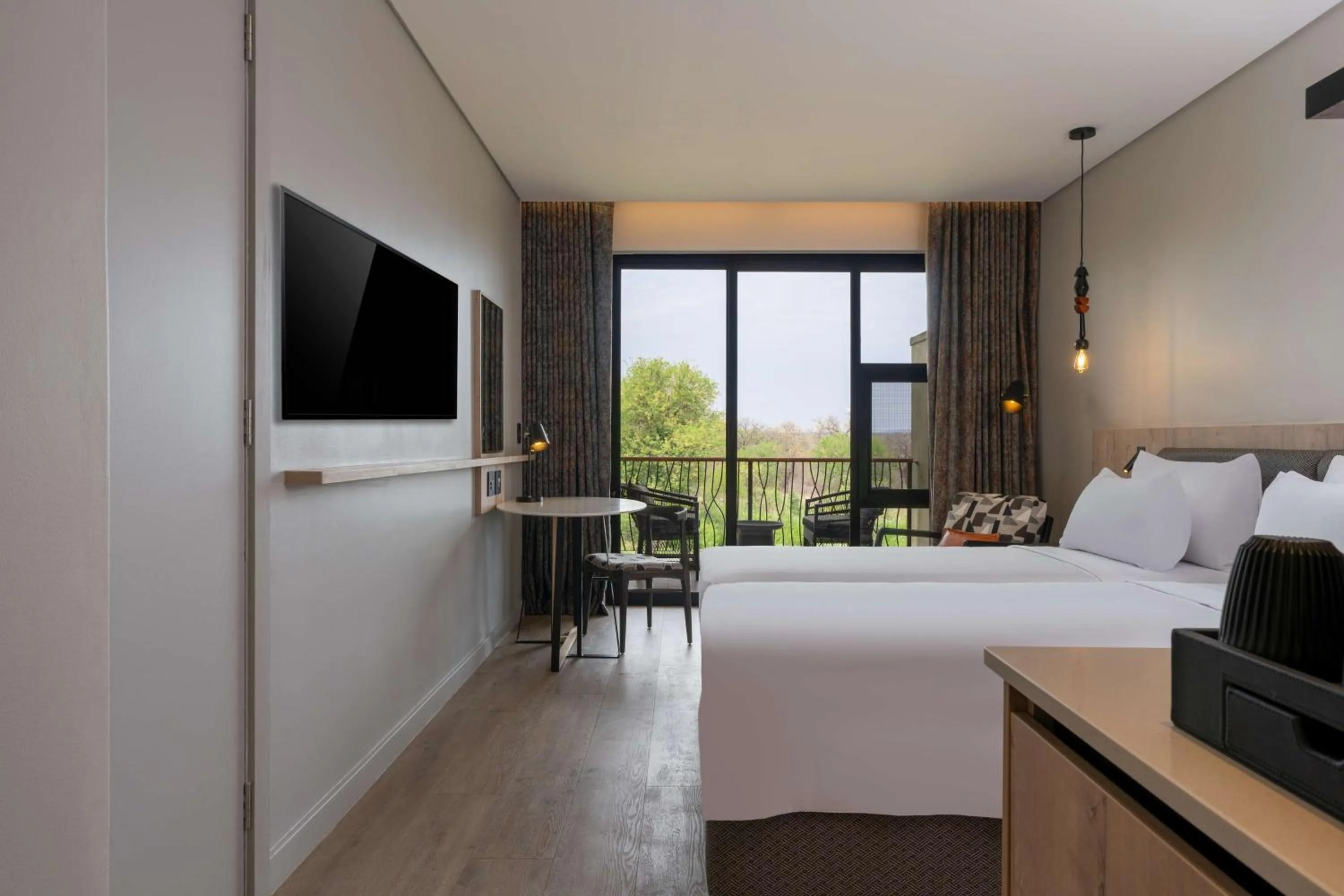 Bedroom, Bed in Radisson Safari Hotel Hoedspruit