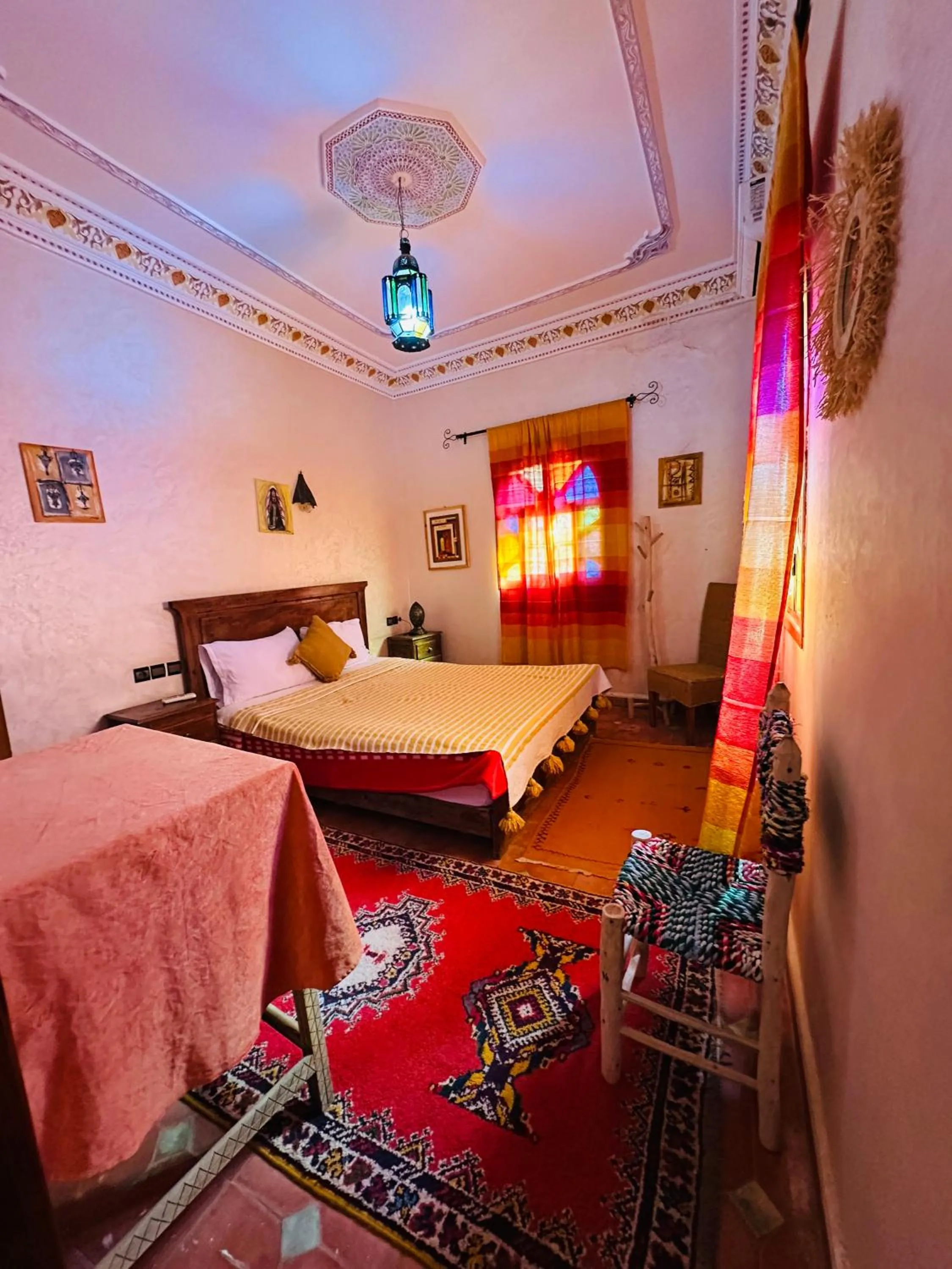 Bed in Riad Soleil du Monde