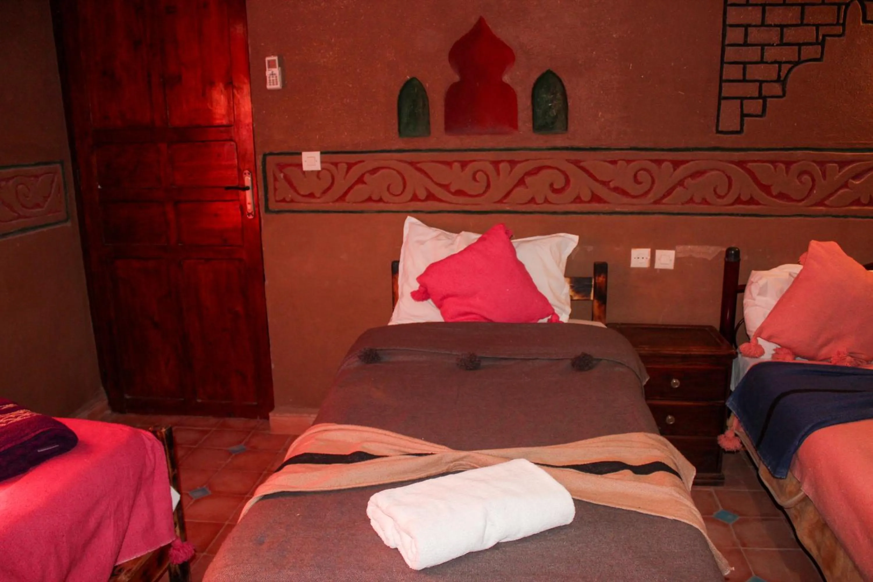 Bed in Riad Soleil du Monde