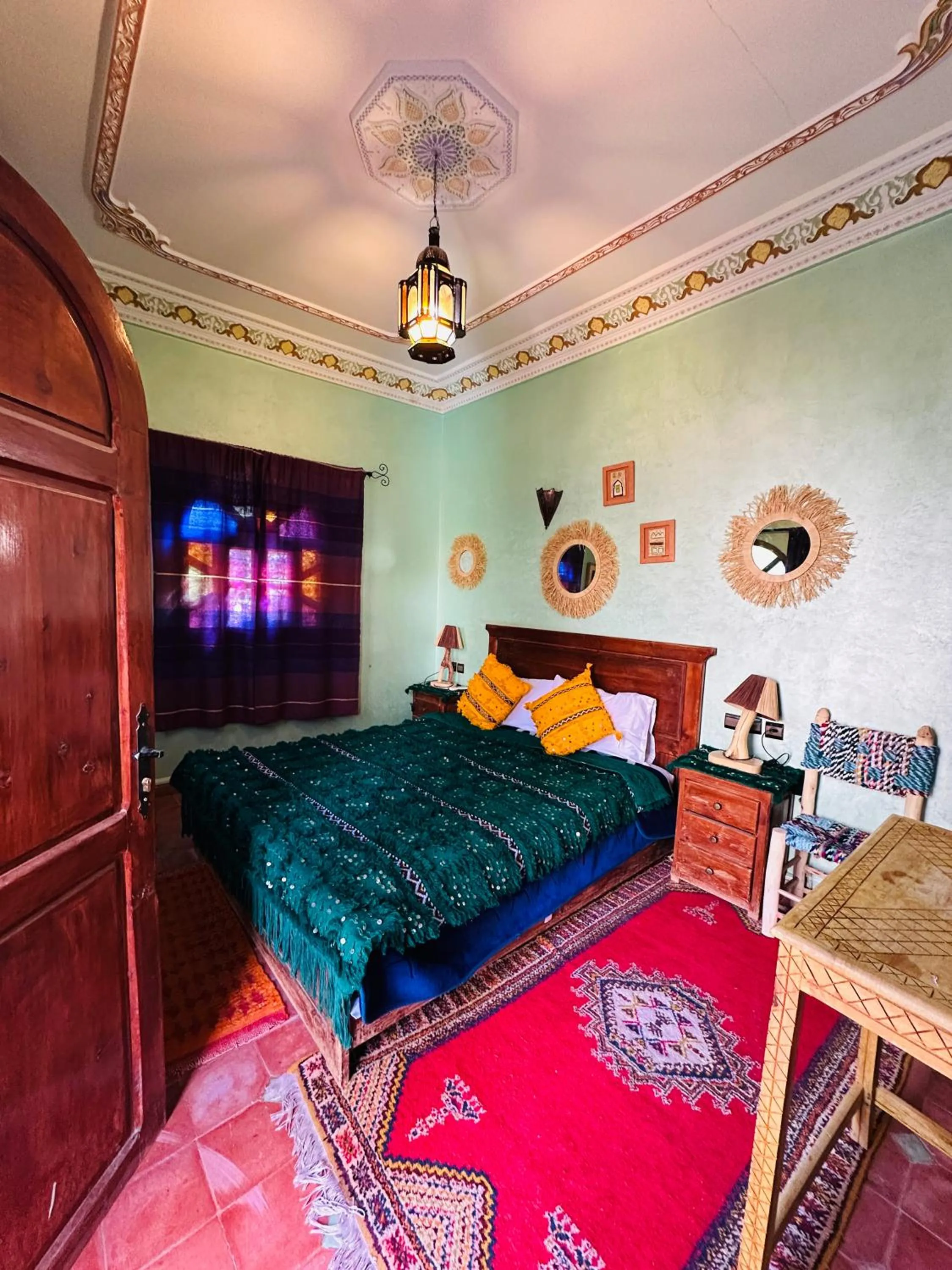 Bed in Riad Soleil du Monde